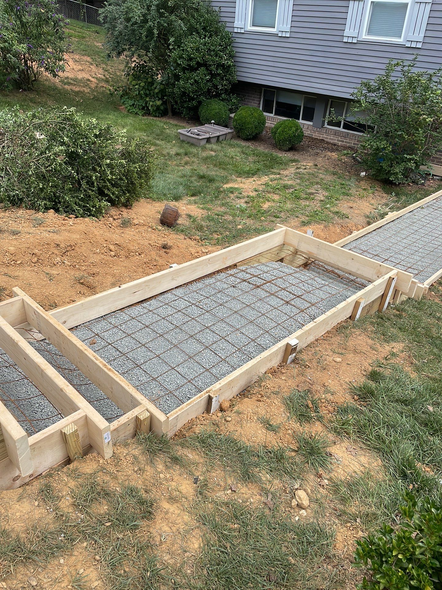 New walkway with stairs and a new front porch by Fairfax Contractors, LLC