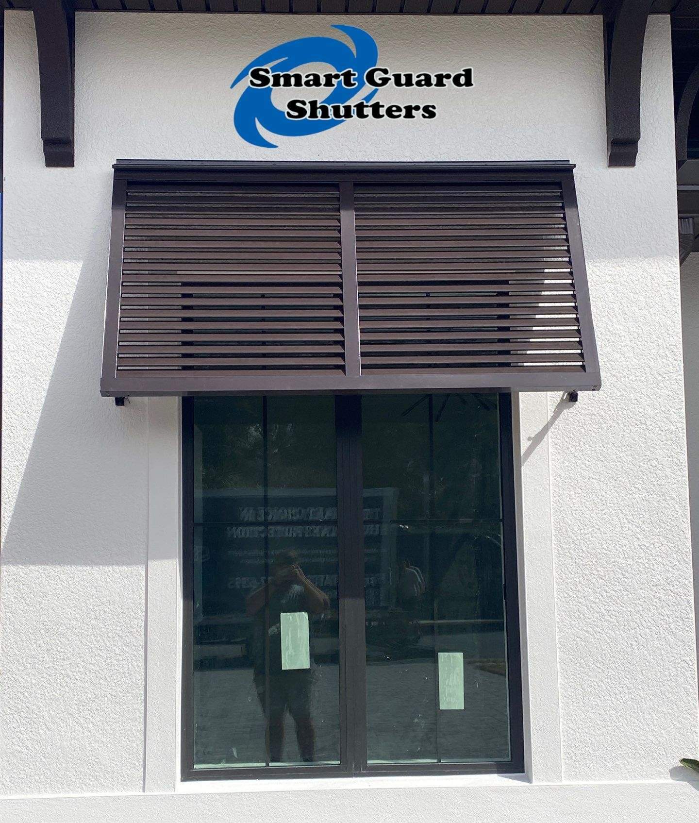 Decorative Bahamas in Grey Brown by Smart Guard Shutters