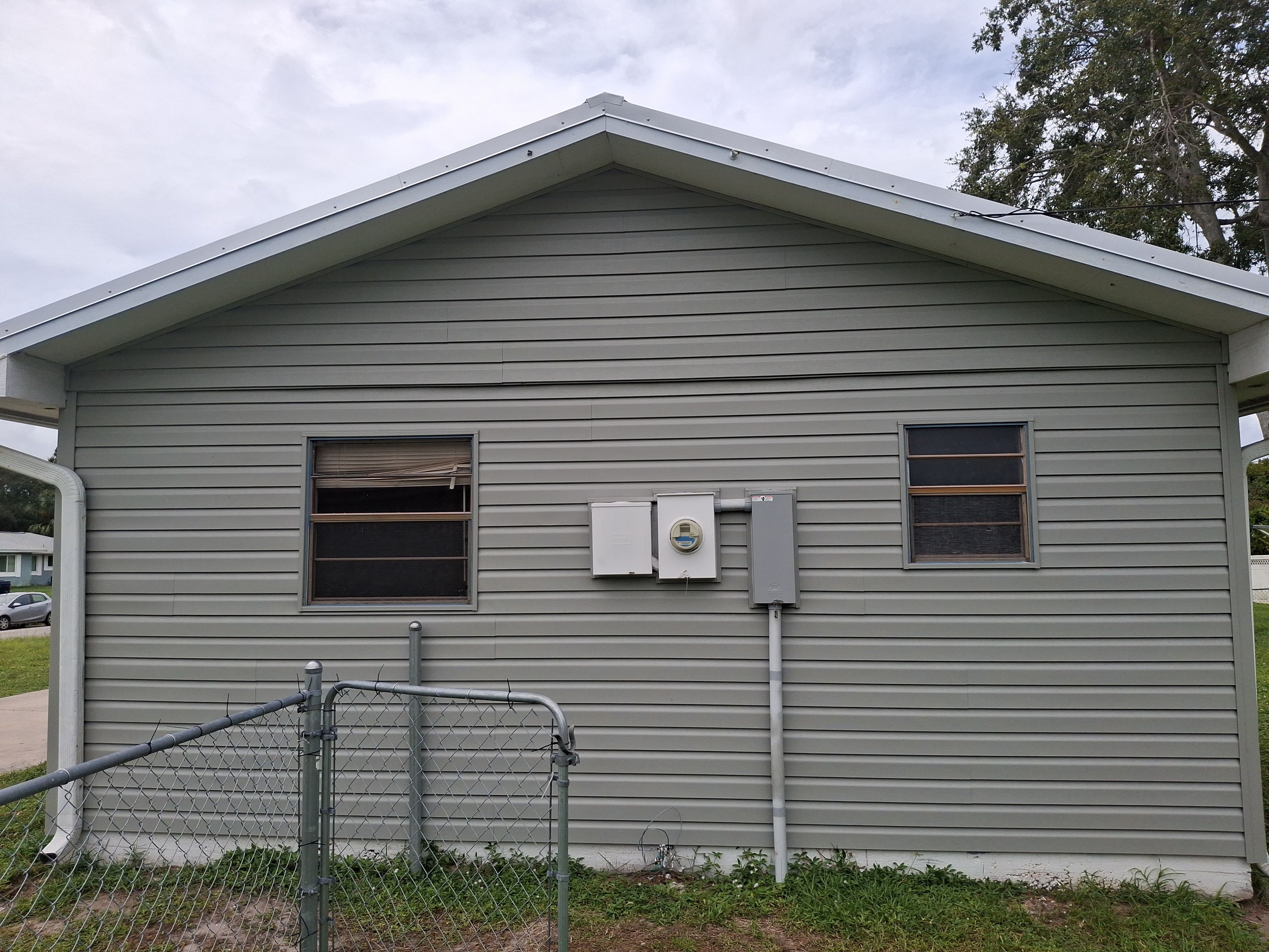 Vinyl Siding Installation and Structural Wood Rot Repair in Palm Bay by Florida Roofing and Renovations Inc.