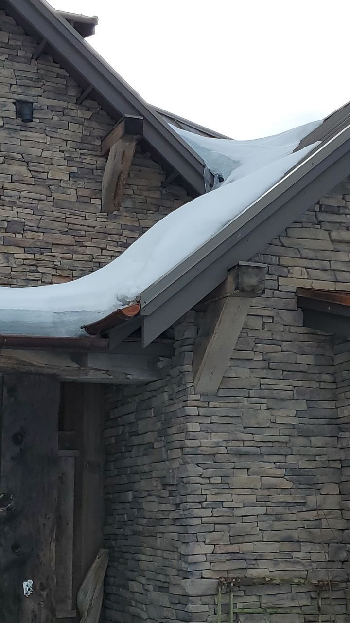 Residential Roofing Installation using Brava Synthetic Slate in Bozeman, MT by swagg construction