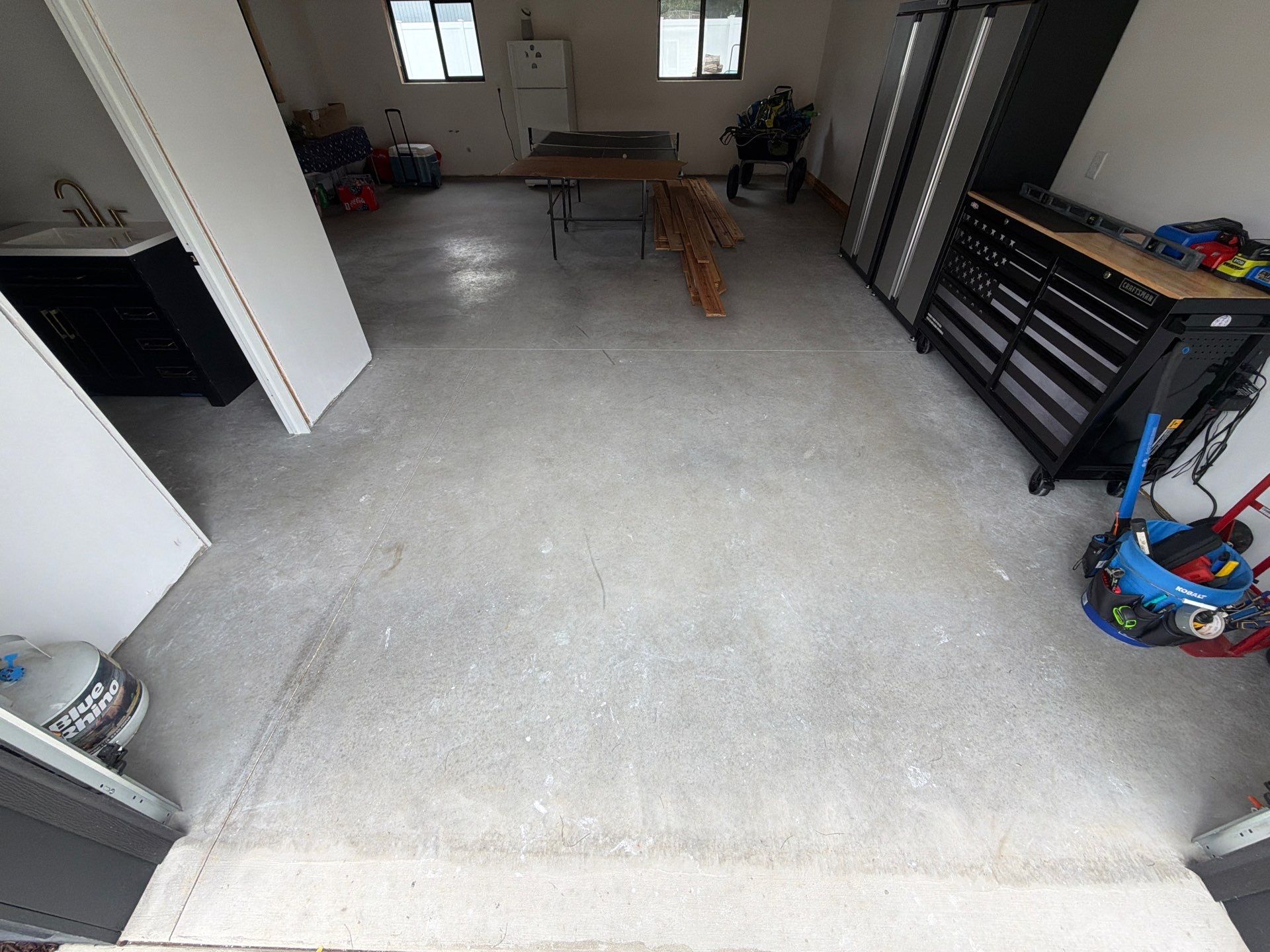 Multi-Room Epoxy Flake Floor Installation Throughout Pentwater Residence by Gordon Painting