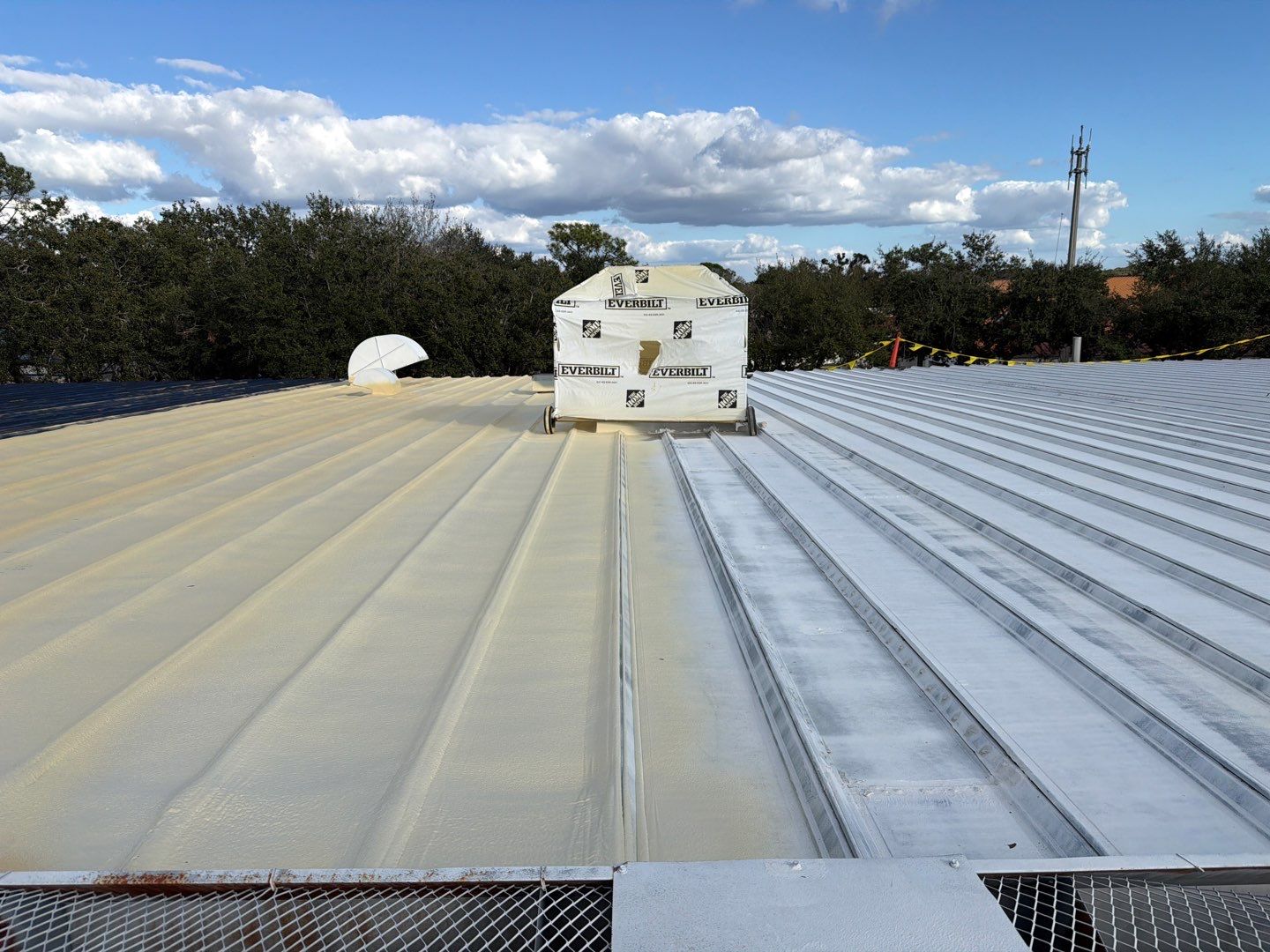 Sarasota Industrial Warehouse Metal Roof Silicone Coating Restoration by CES Roofing