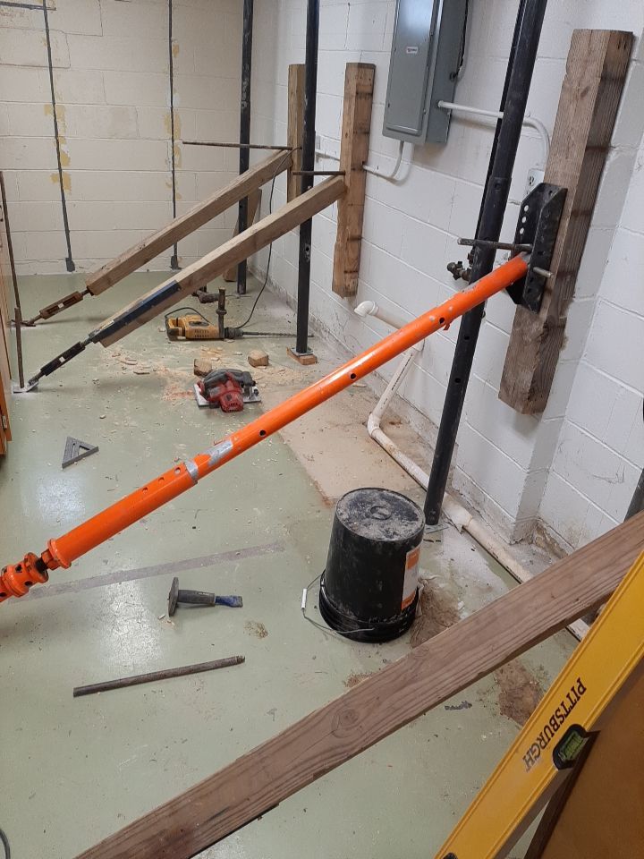 Wall Straightening and Reinforcement using Embedded Fiber Reinforcement by Toledo Basement Repair 