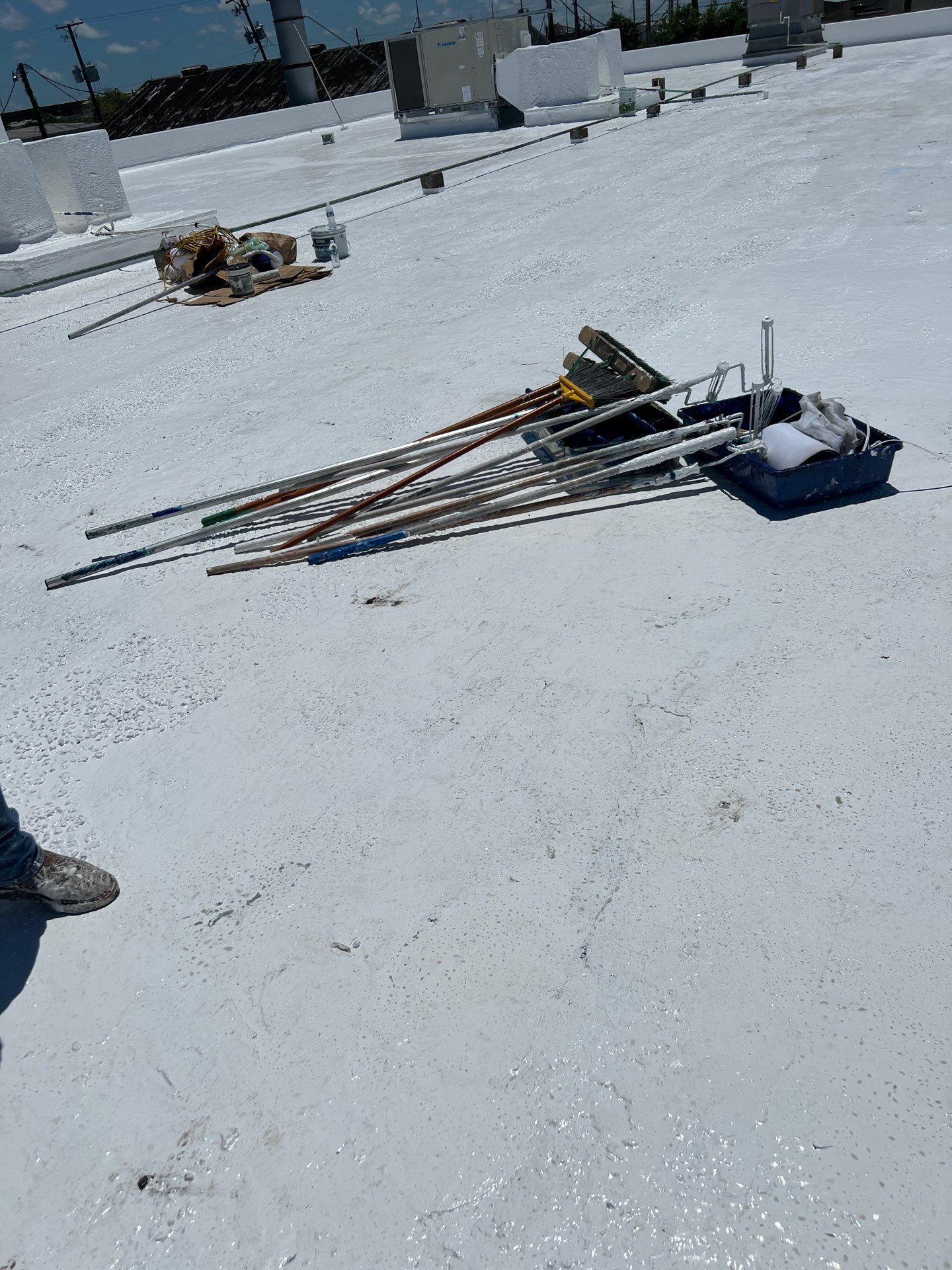 Dirty leaking Gravel Roof by Bayfront Roofing and Construction