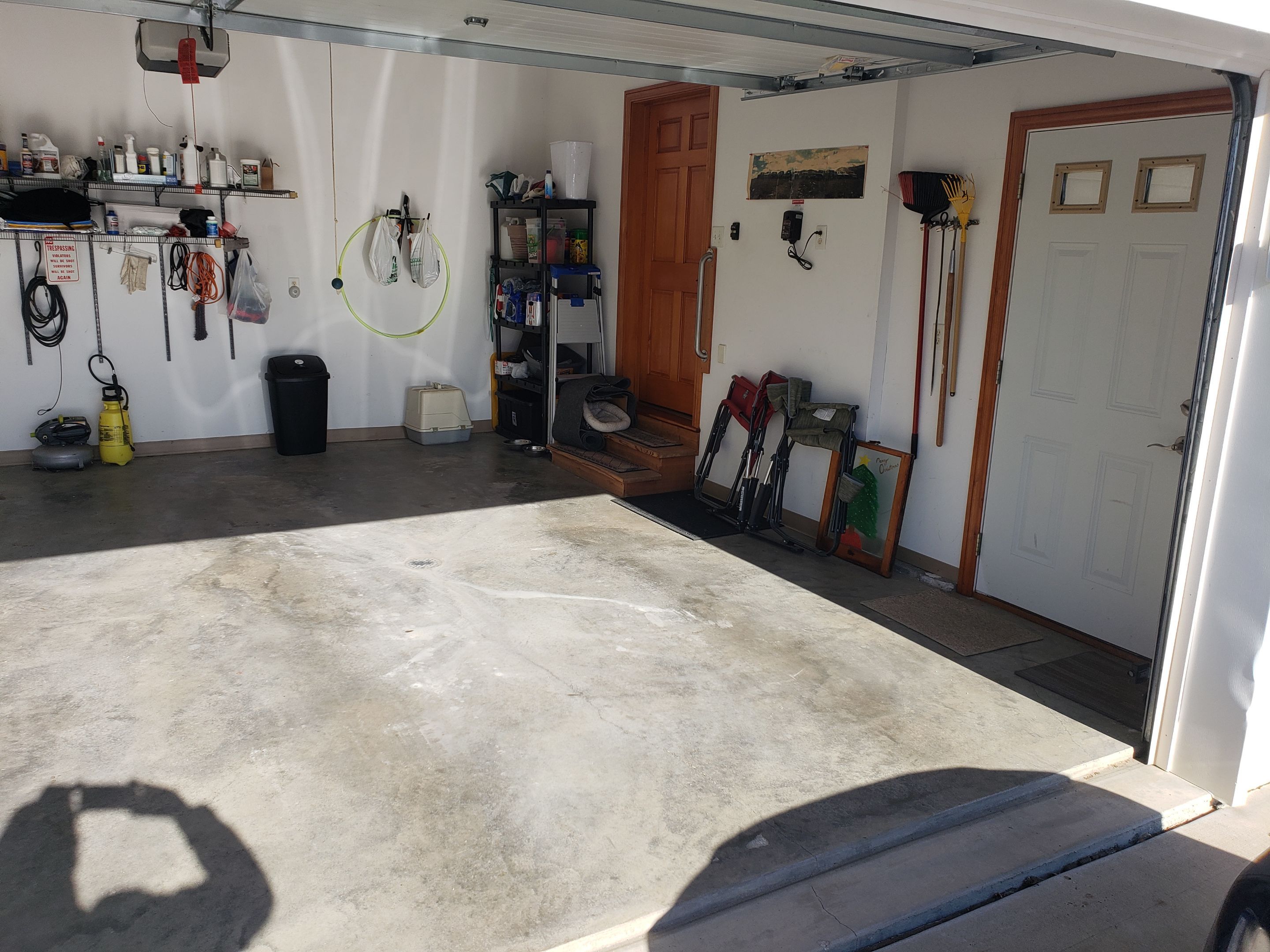 St. Joseph -- Front Patio and Garage Epoxy Garage Coating System by Big Red Decorative Concrete, LLC