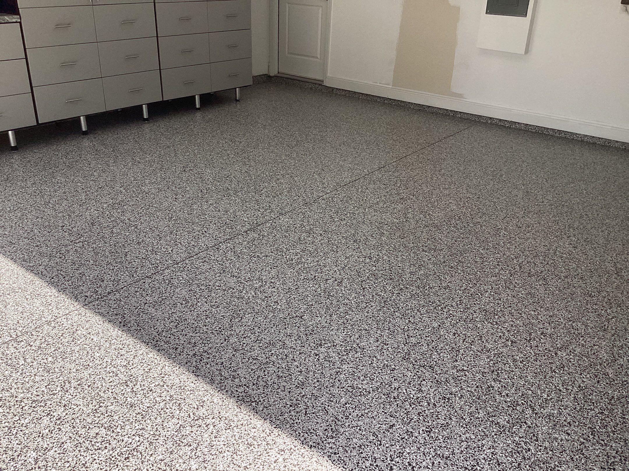 Garage using Domino by Amvet concrete coatings llc