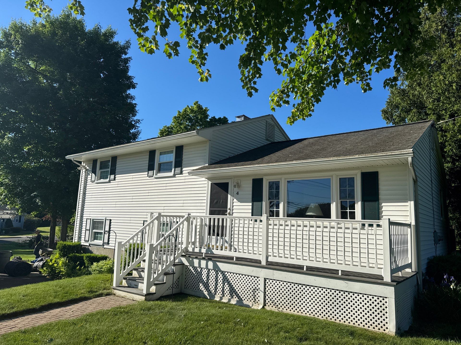Beautiful new asphalt shingles on a roof in Vernon! by DiGiorgi Roofing and Siding Inc