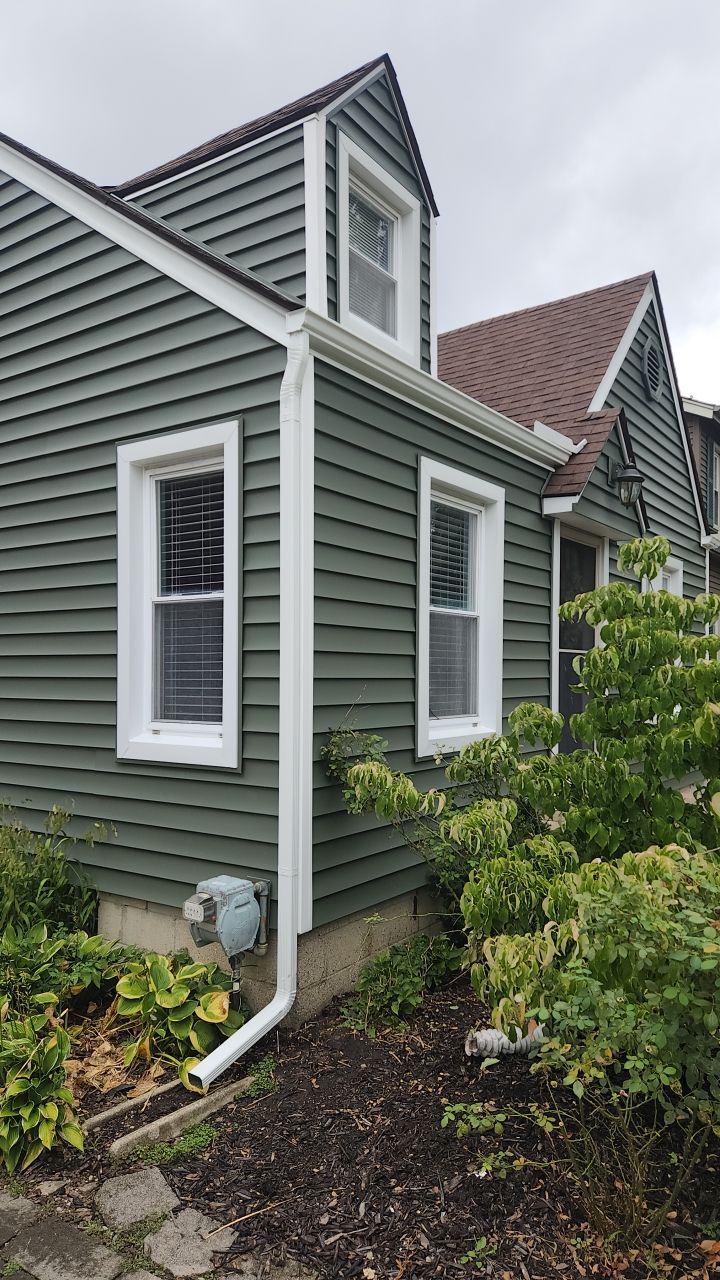 Siding Replacement using CertainTeed Restoration Classic D5 Forest Green by 180 Contractors