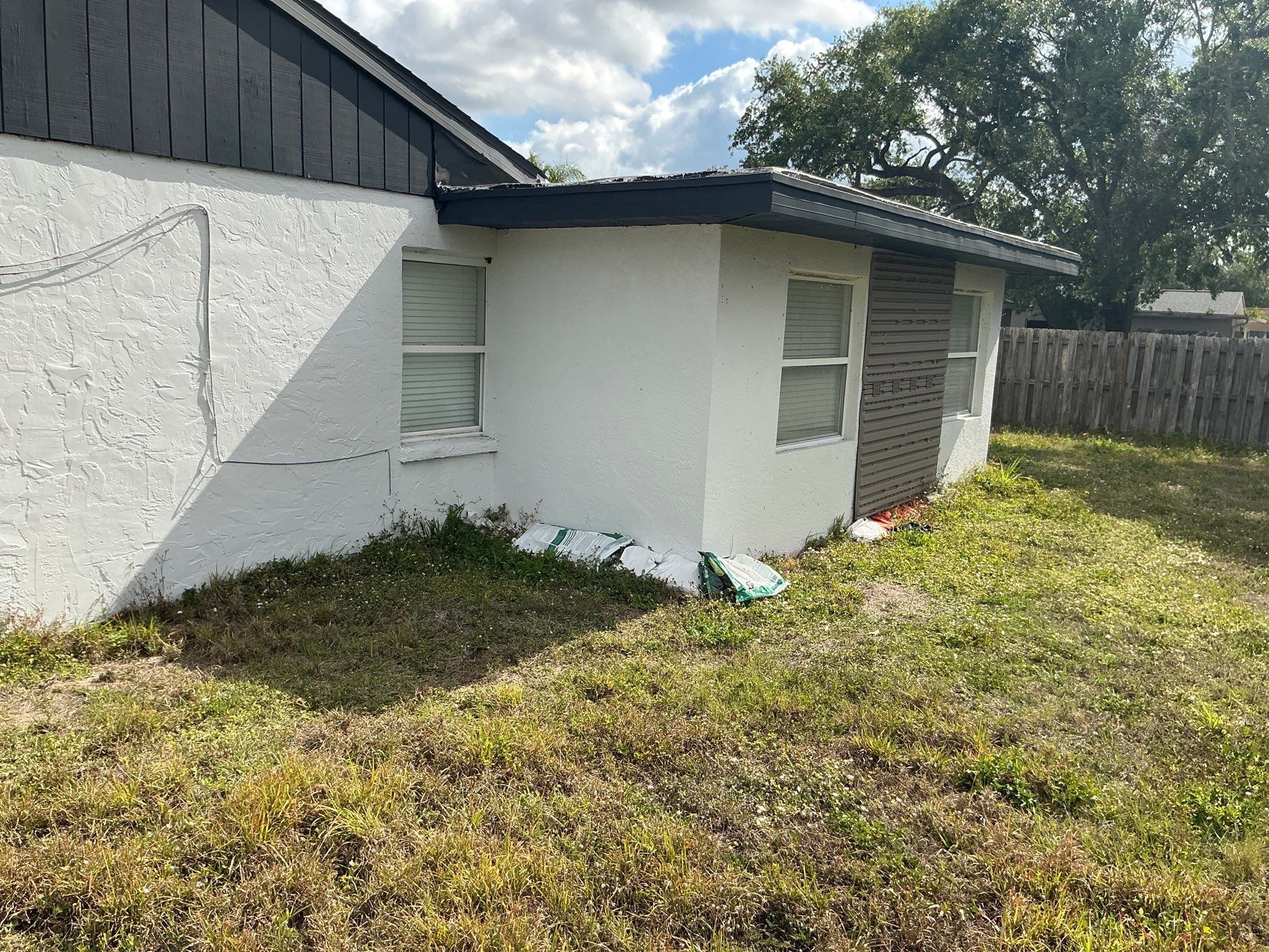 New Downspouts and Splash Guards in Sarasota FL by Gutter Professors