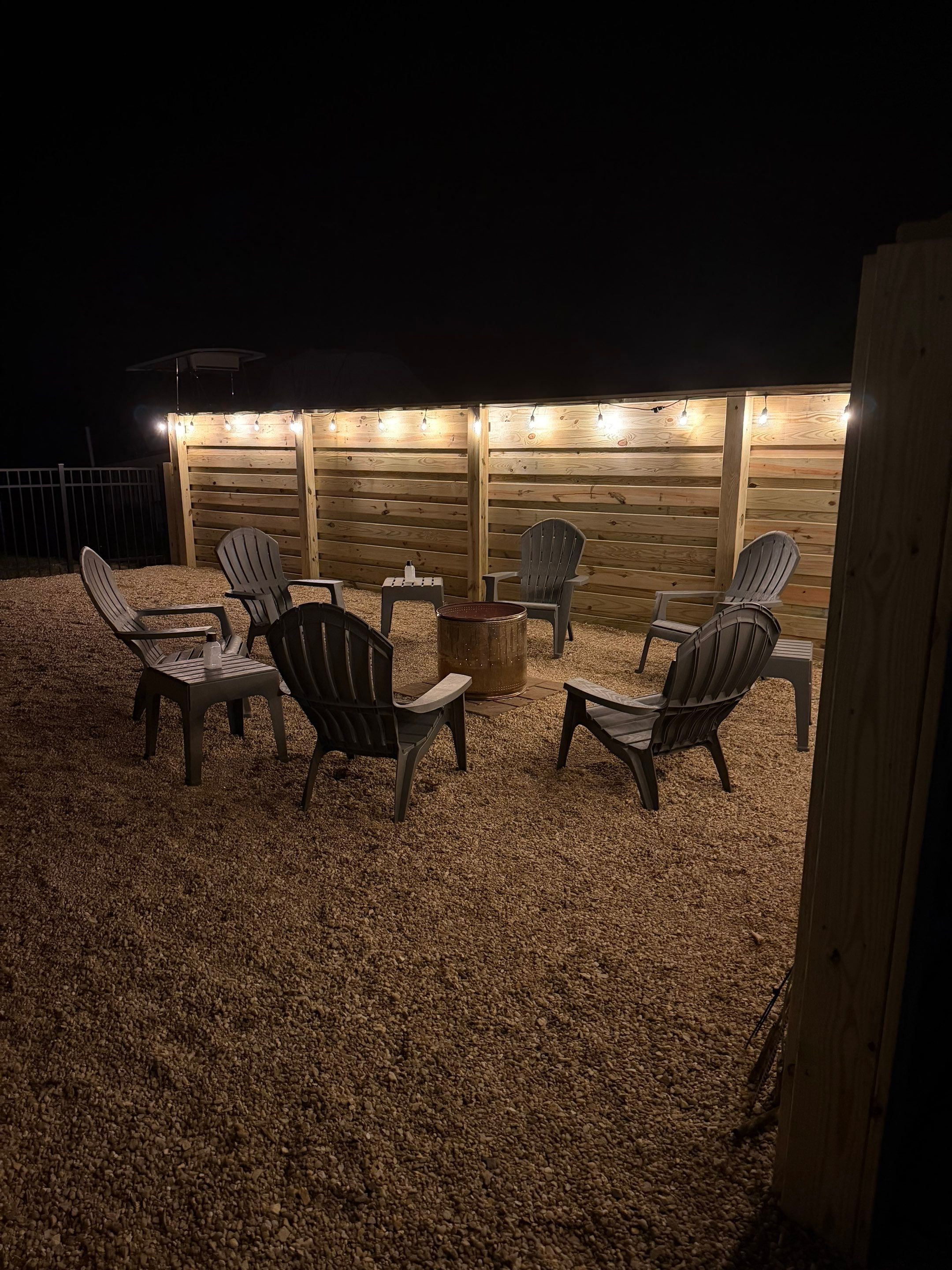Modern Horizontal Wood Privacy Fence and Backyard Patio in Greenville by Superior Fence and Rail