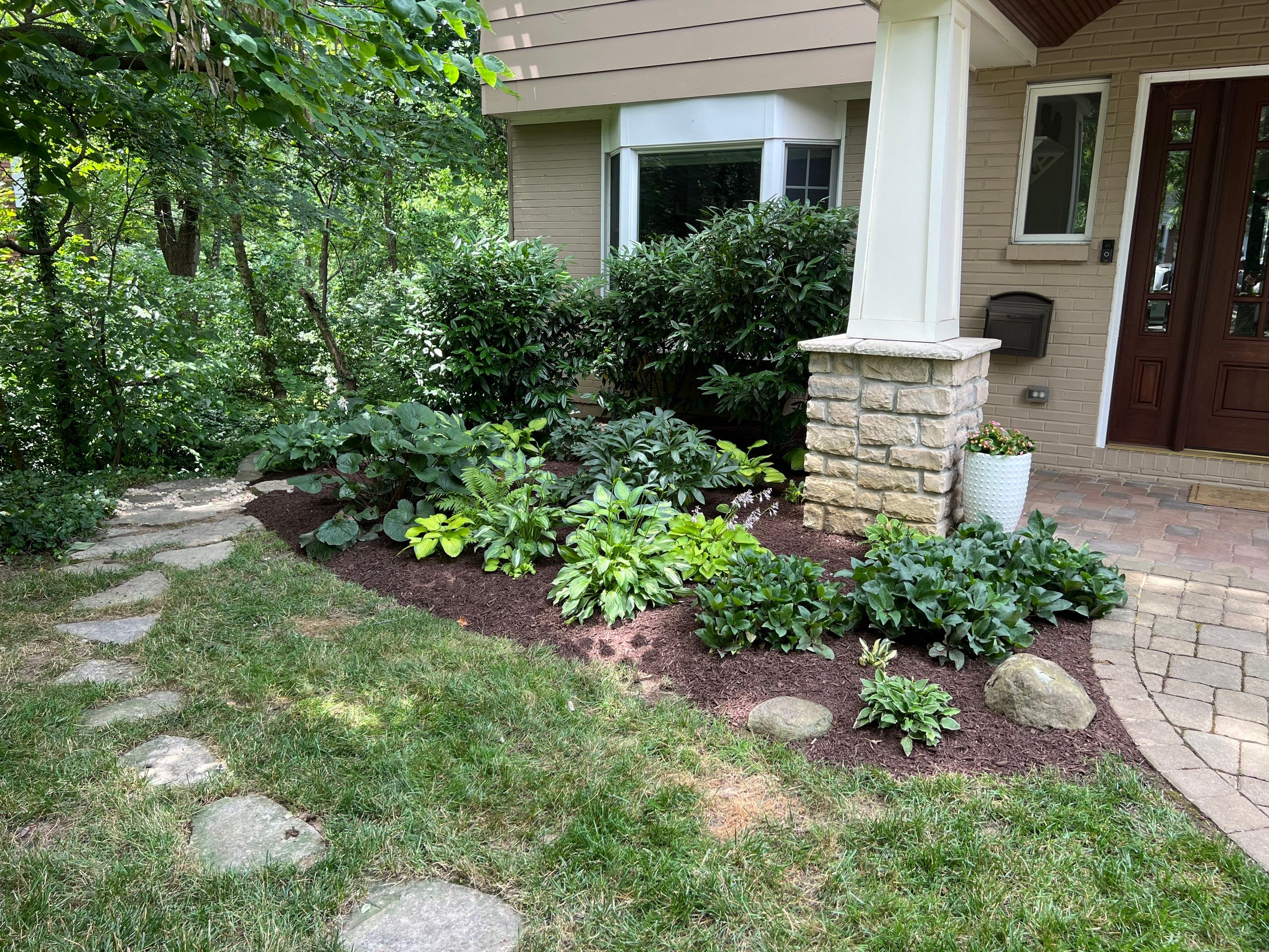 Spring Clean Up with additional Gravel Worl & Plant Installation by Reisenberg’s Lawn & Landscape, LLC