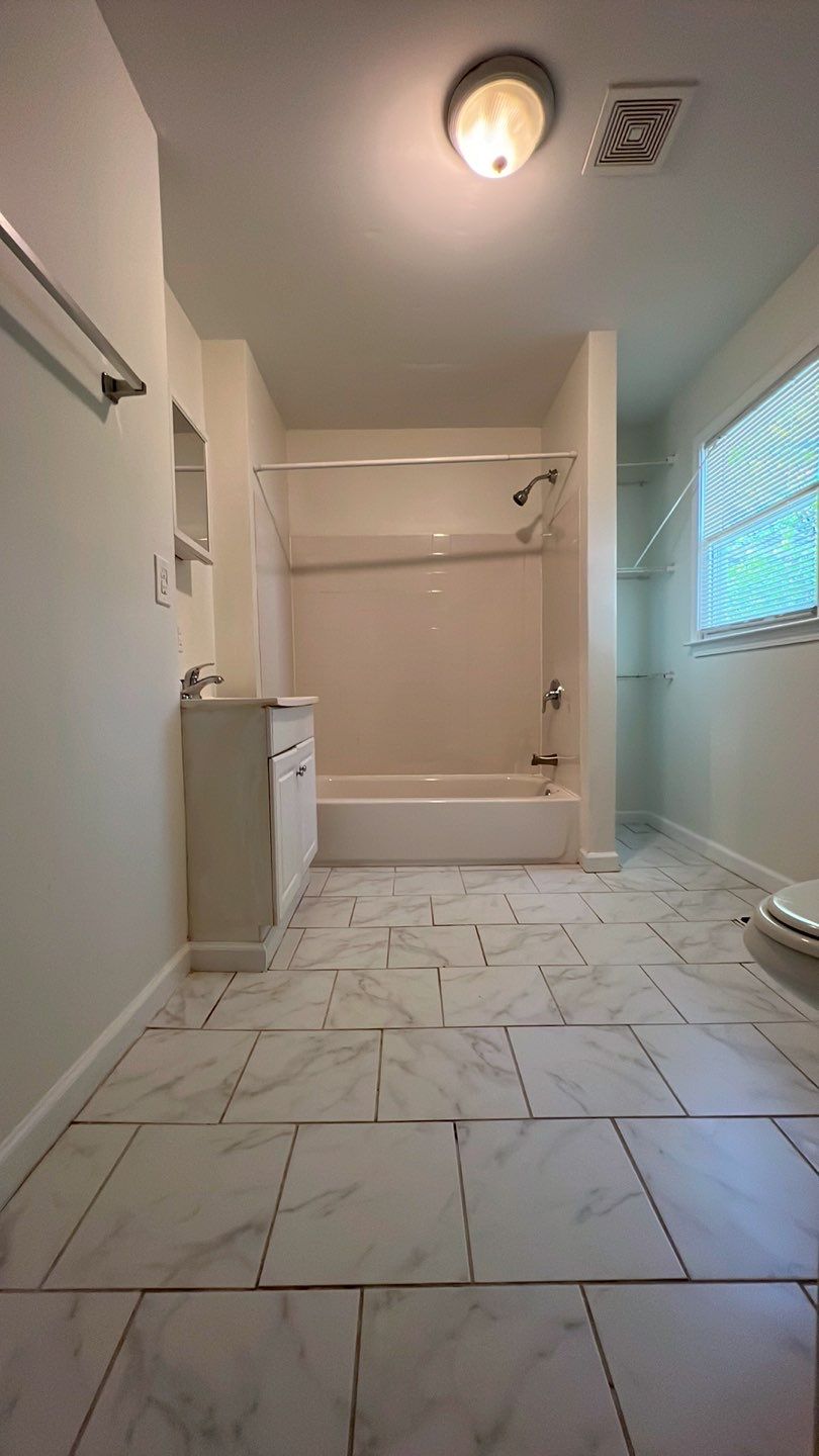Atlanta Interior Renovation Featuring Hardwood Floors and New Paint by Swift Home Renovations