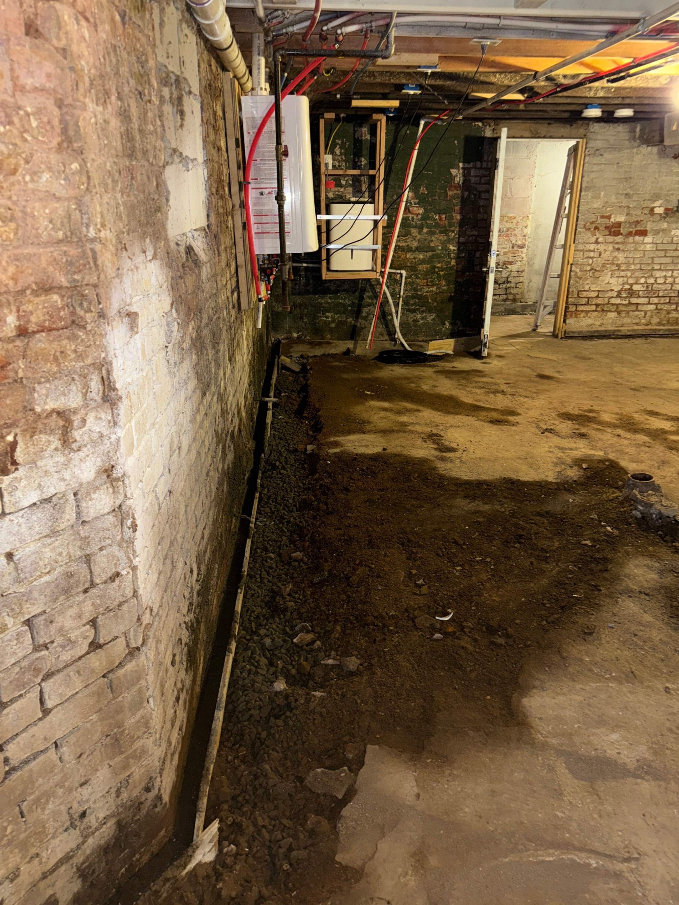 Interior French Drain & Wall Vapor Barrier in Newark, NJ  by Pure Service Pro, LLC 