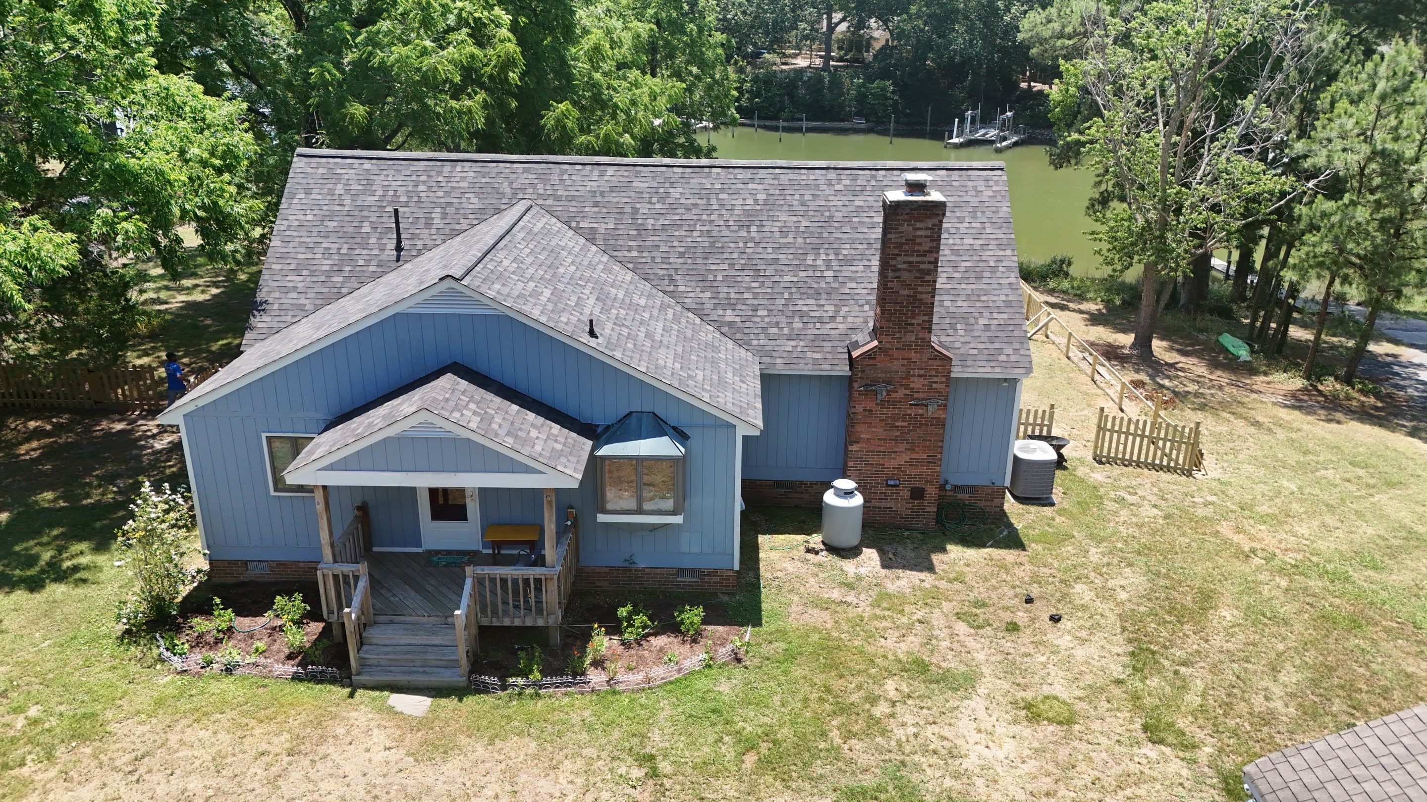 Complete Asphalt Shingle Roof Replacement and Sheathing Repair in Deltaville by Cade Construction