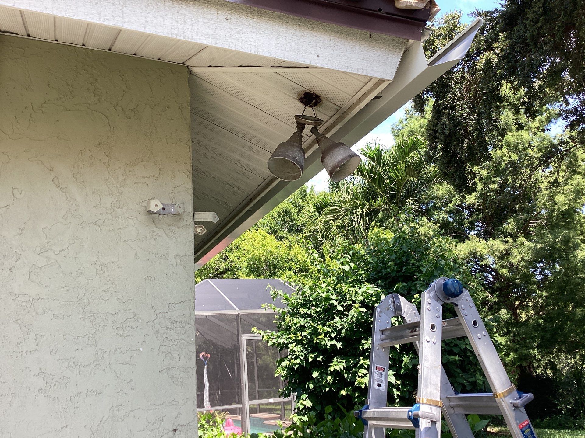 White Gutter Installation in Sarasota FL by Gutter Professors