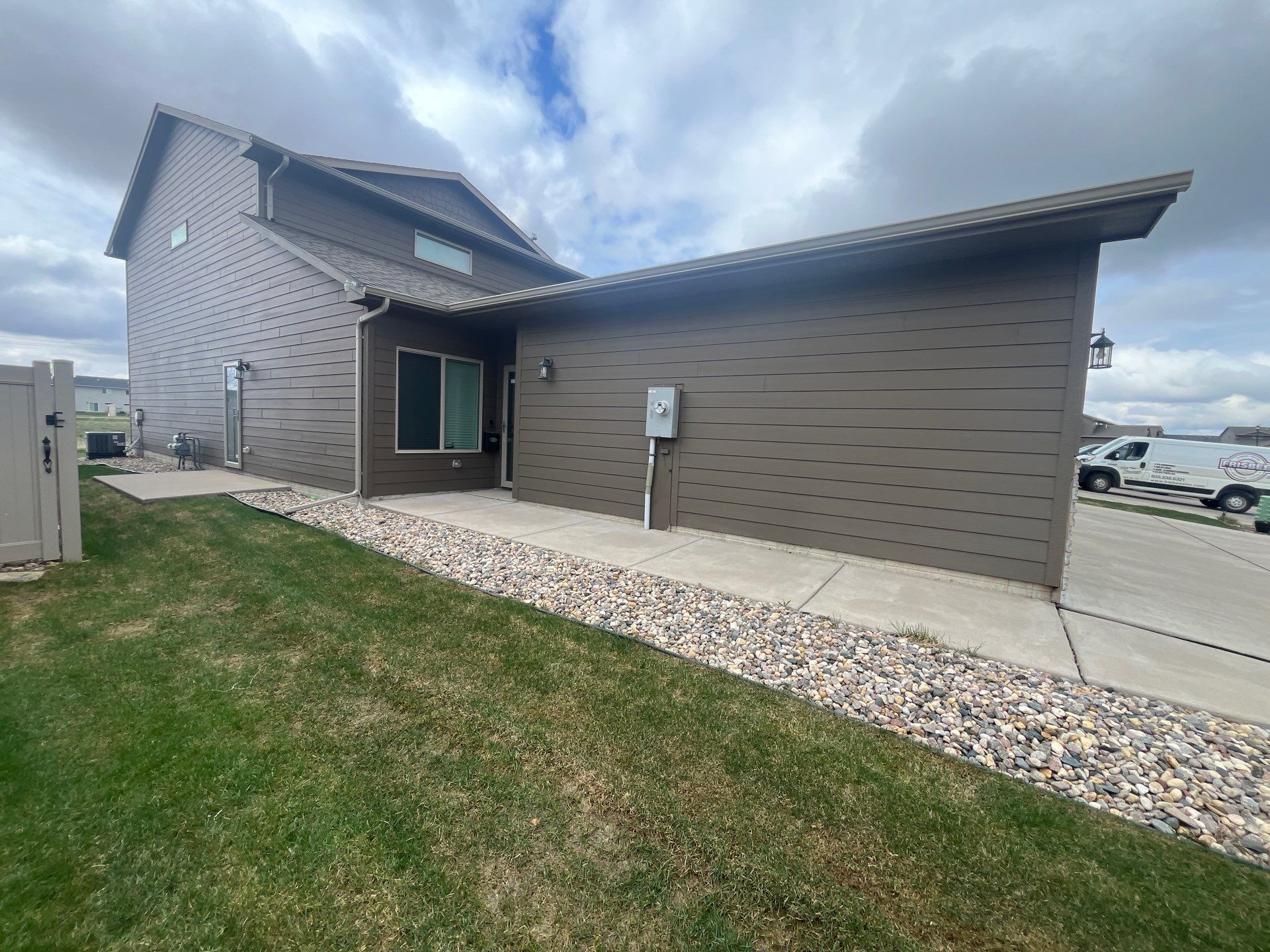 Exterior Painting for Multi-Unit Townhomes in Sioux Falls by Select Painting, Coatings & Garage Cabinets