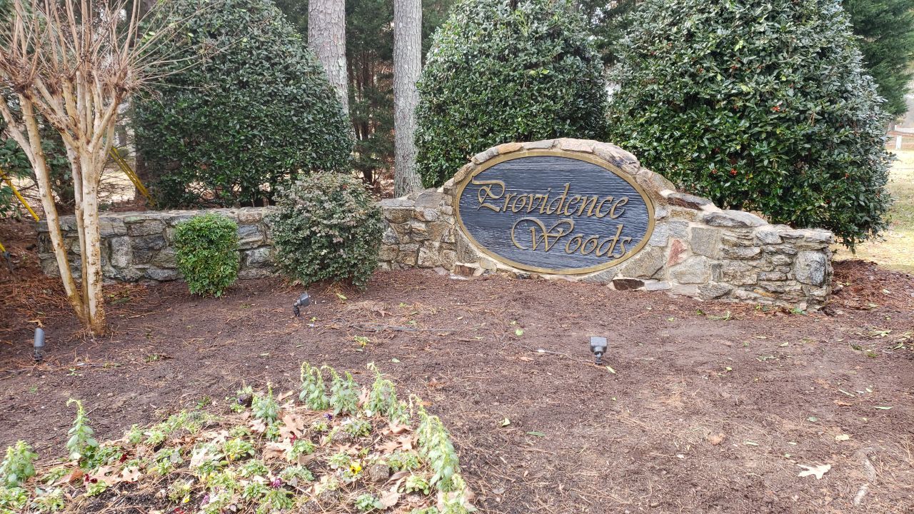 Neighberhood entrance sign cleaing using cleaner by Power Wash Masters LLC