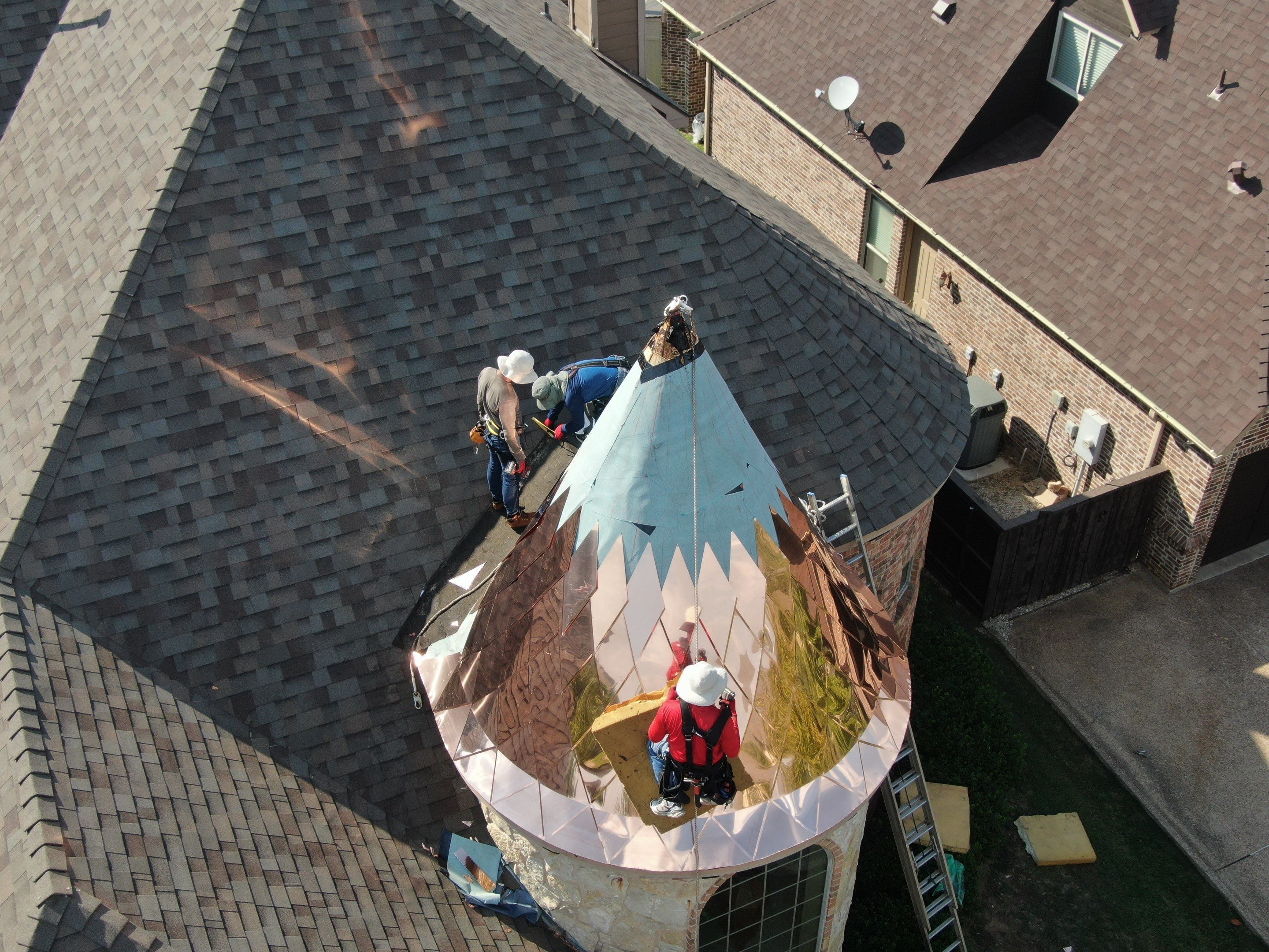 Installing Custom copper turret and Malarkey Vista Class 4 shingles Hail Damage Upgrade by Becker Roofing and Exteriors