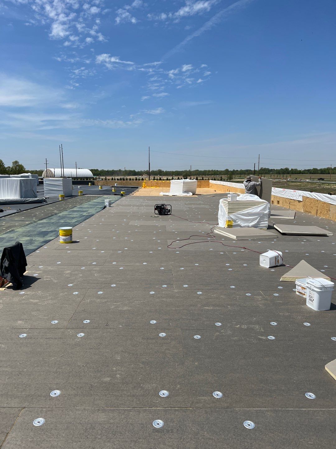 Commercial Roofing Installation using 60 mil rubber roof  by Nitro Roofing and Construction