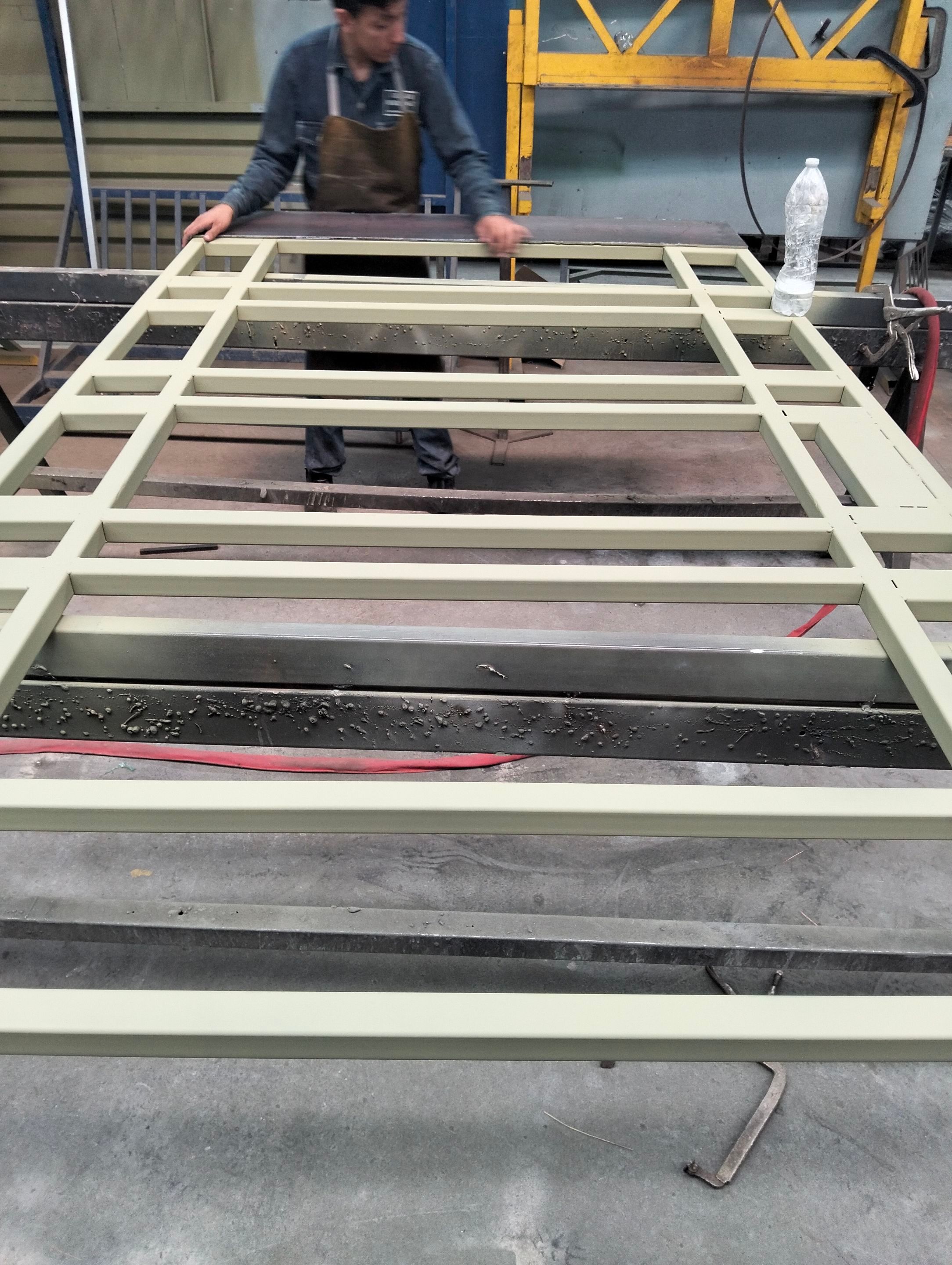 Modern Metal and Glass Entry Door Fabrication and Installation by Solara Custom Living