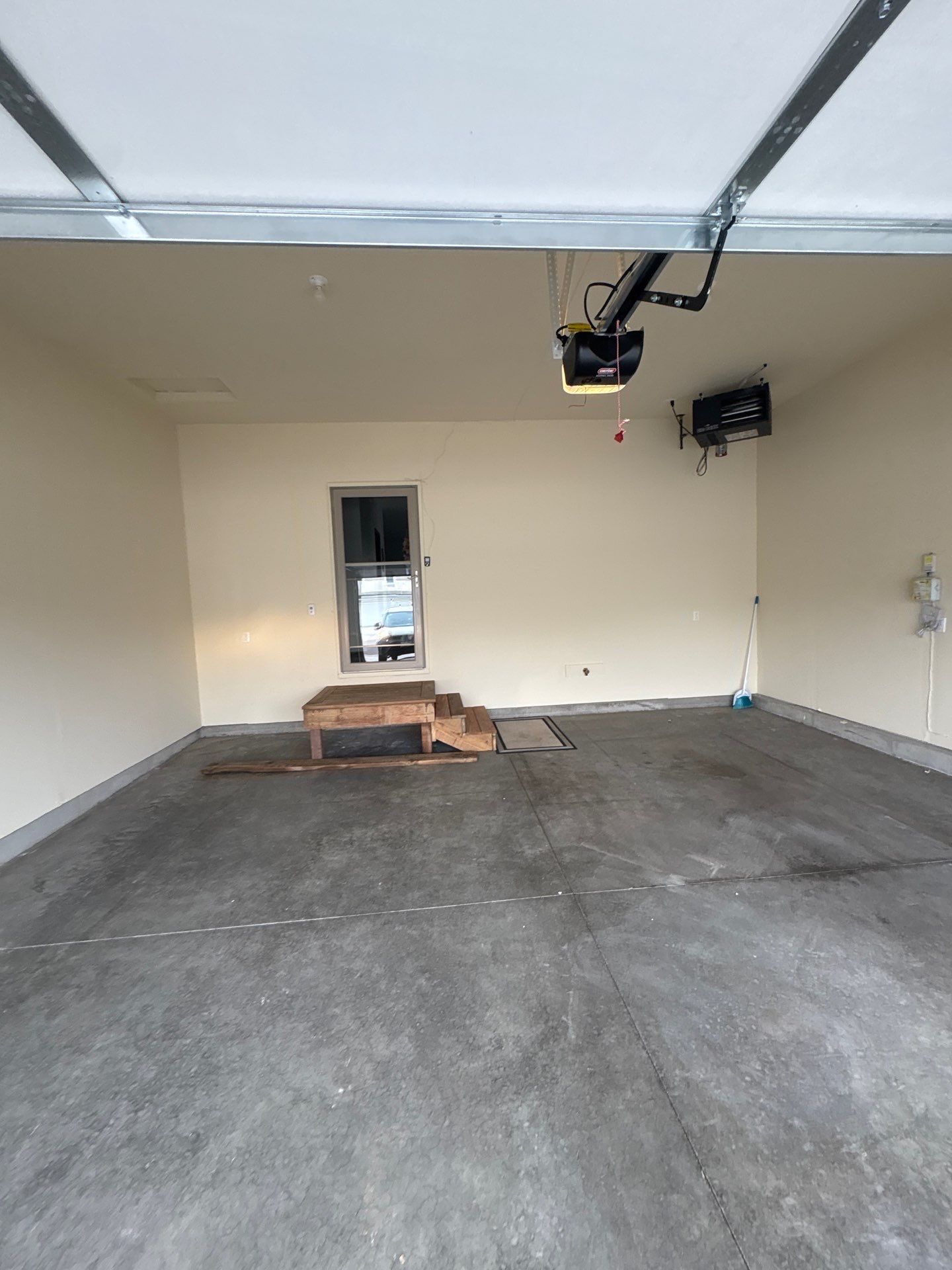 Garage Interior Finishing and Custom Wood Step Construction in Sioux Falls by Select Painting, Coatings & Garage Cabinets