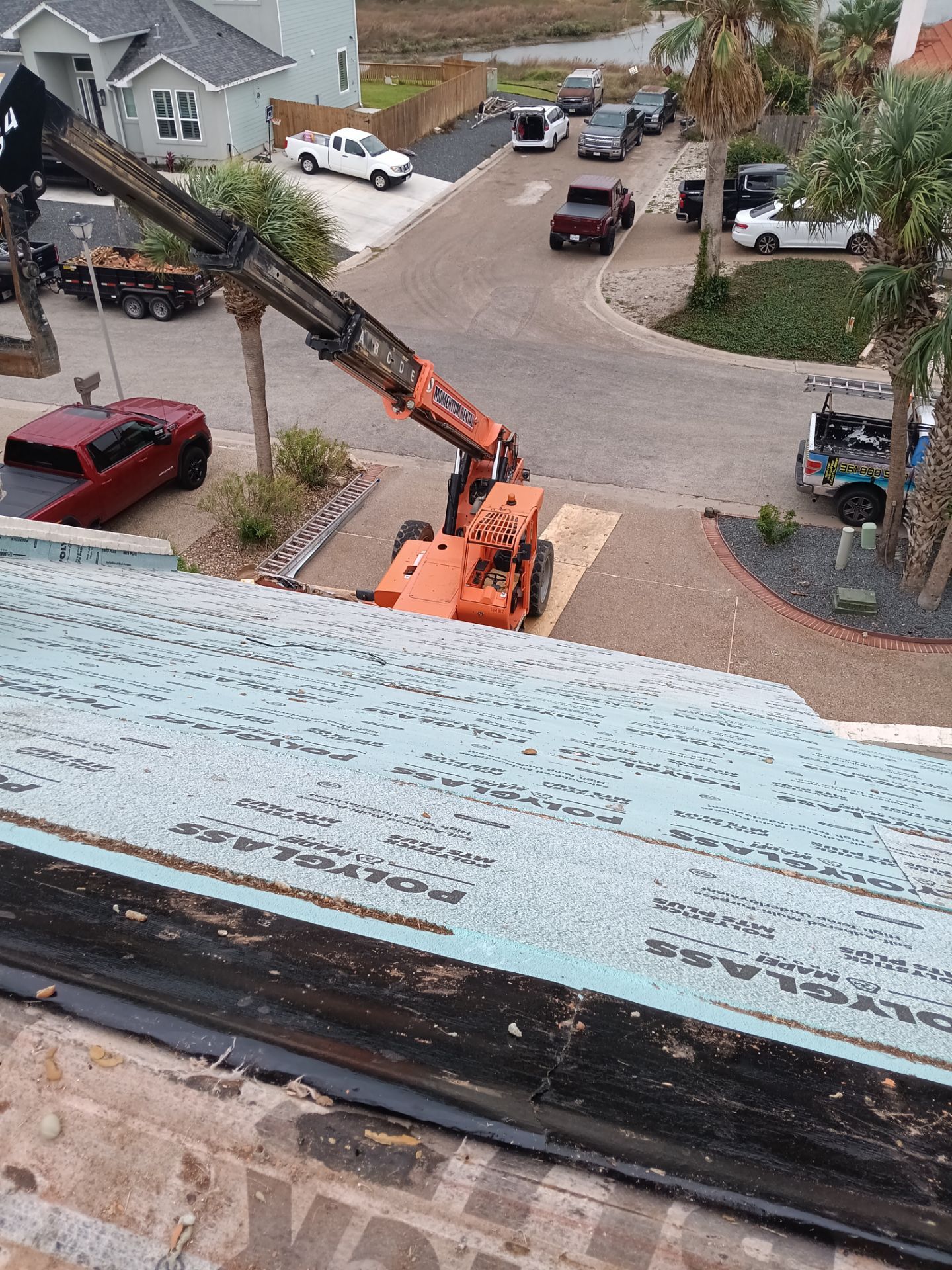 Off with the Tile and on with the TILCOR stone coated metal.  by Bayfront Roofing and Construction