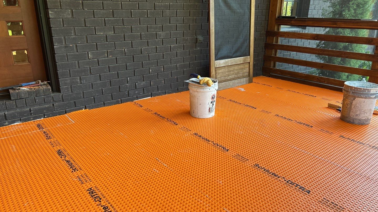 Terra cotta porch  by Footprints Floors of Nashville