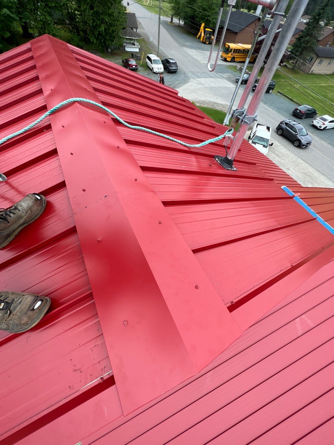 Commercial Roofing Installation using 12" Prolok metal  by Top Notch Roofing Inc