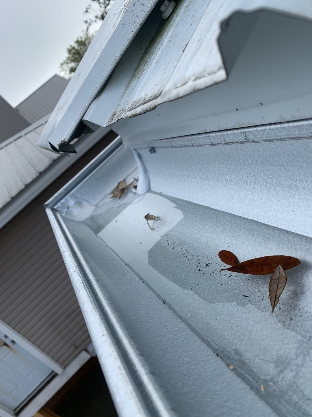 Gutter Installation using Half Round Seamless Gutters by Gutter Professors