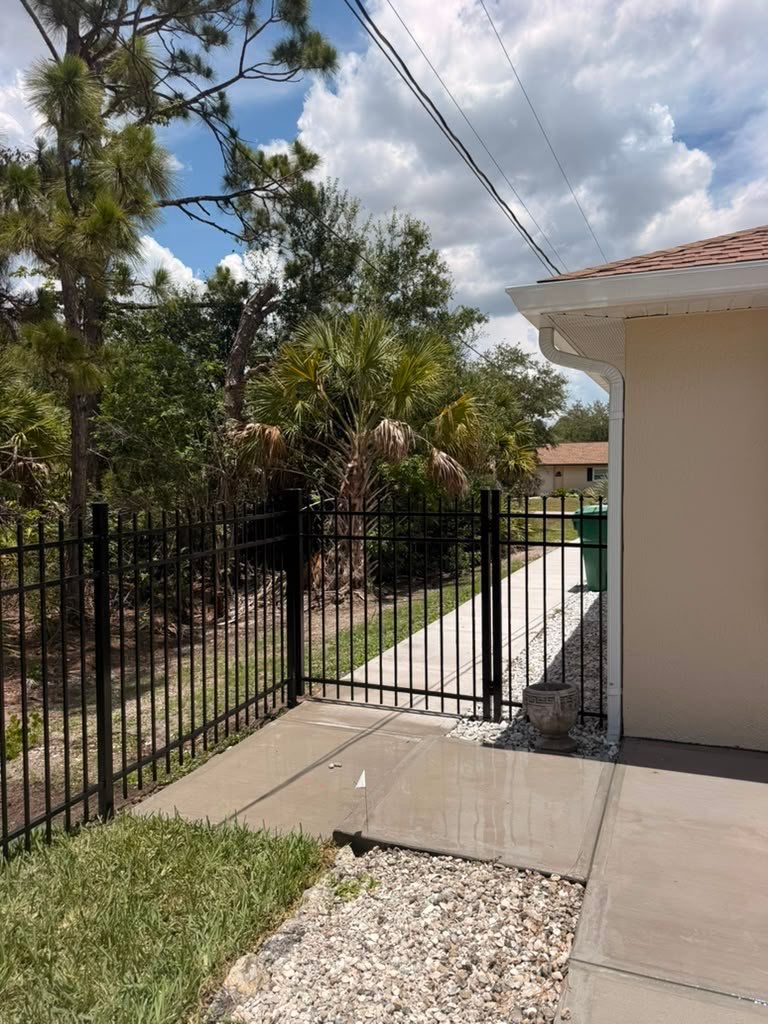 Black Aluminum Spear Top Picket Fence Installation in Englewood by True Fence LLC
