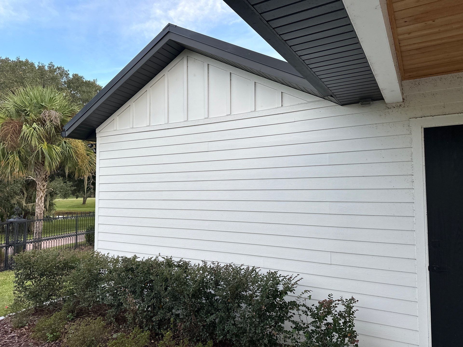 Complete Two-Story House Wash and Driveway Cleaning in Winding River Community, Bradenton, FL by Sunshine AquaWash