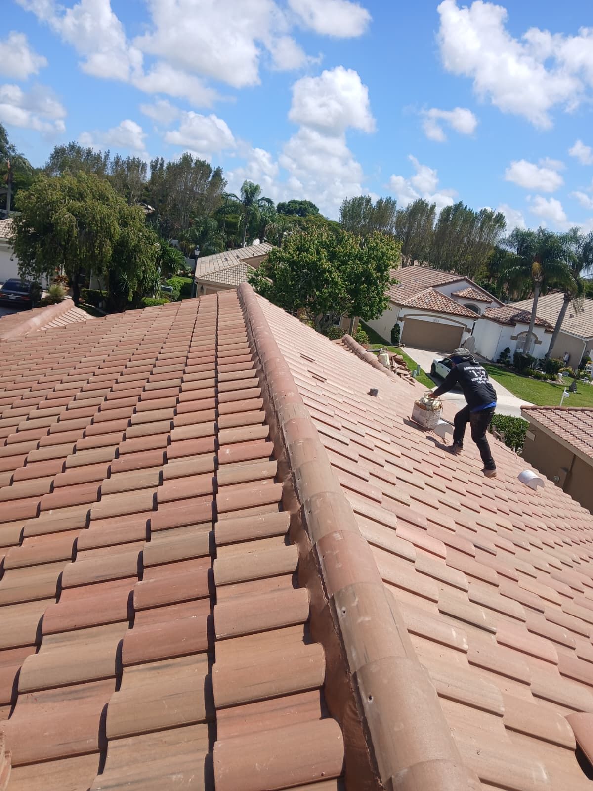 New Barrel Tile Roof Installation and Decking Repair in Boynton Beach by Aastro Roofing