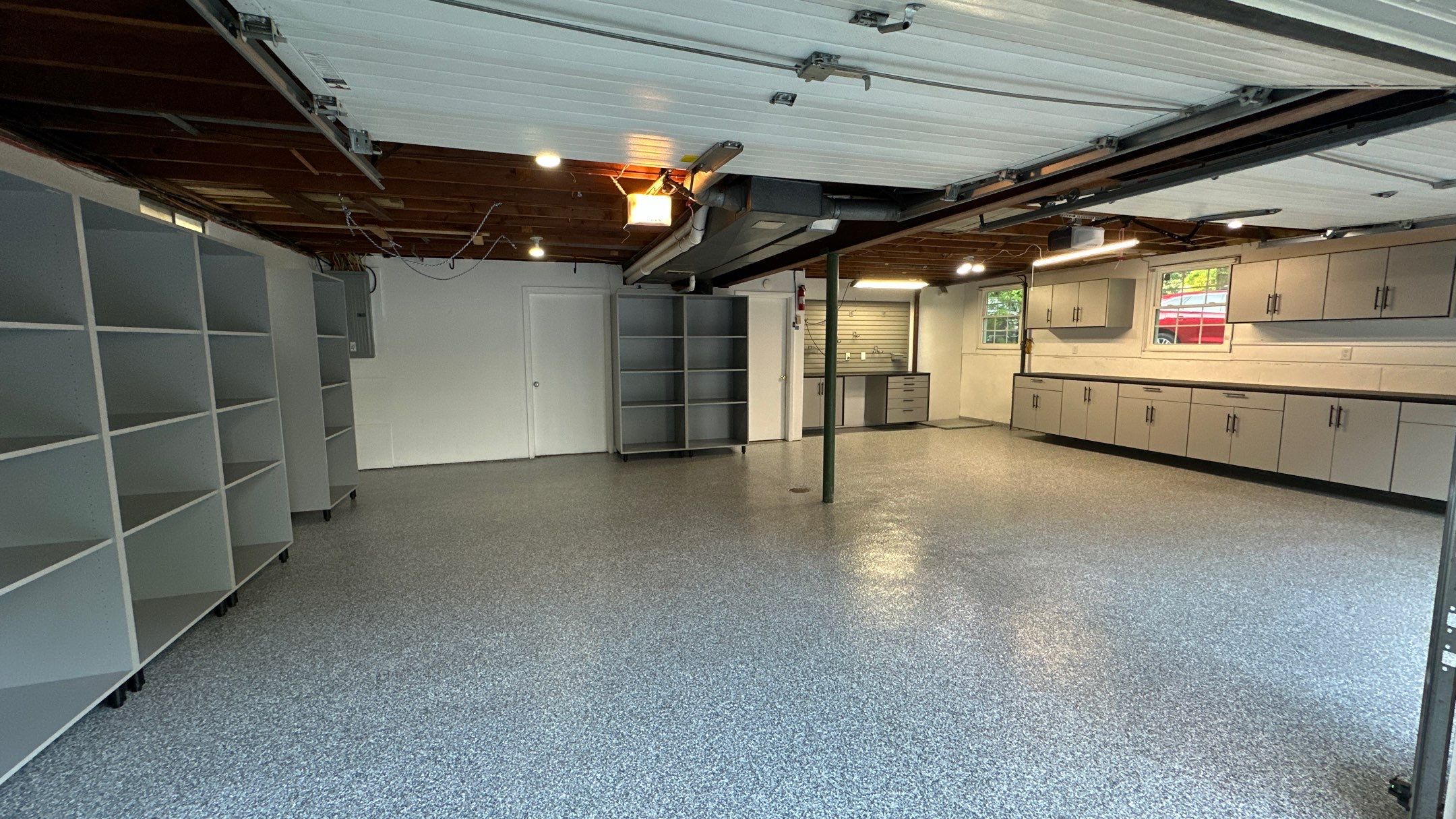 Vernon T. new garage floor and storage looks great!! by Banner Garage