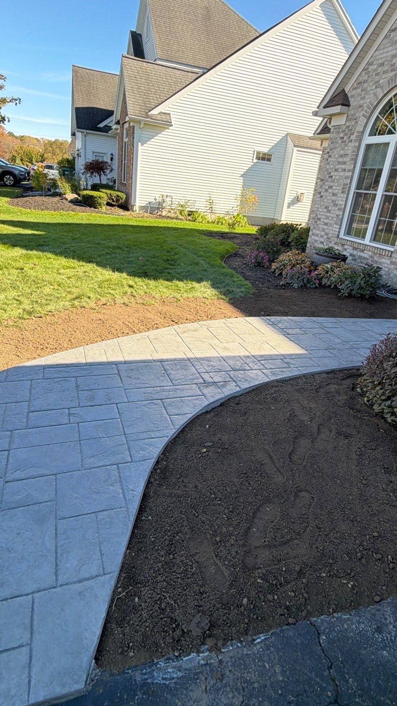 Ashler Slate Stamped Patio by NG Masonry & Construction LLC