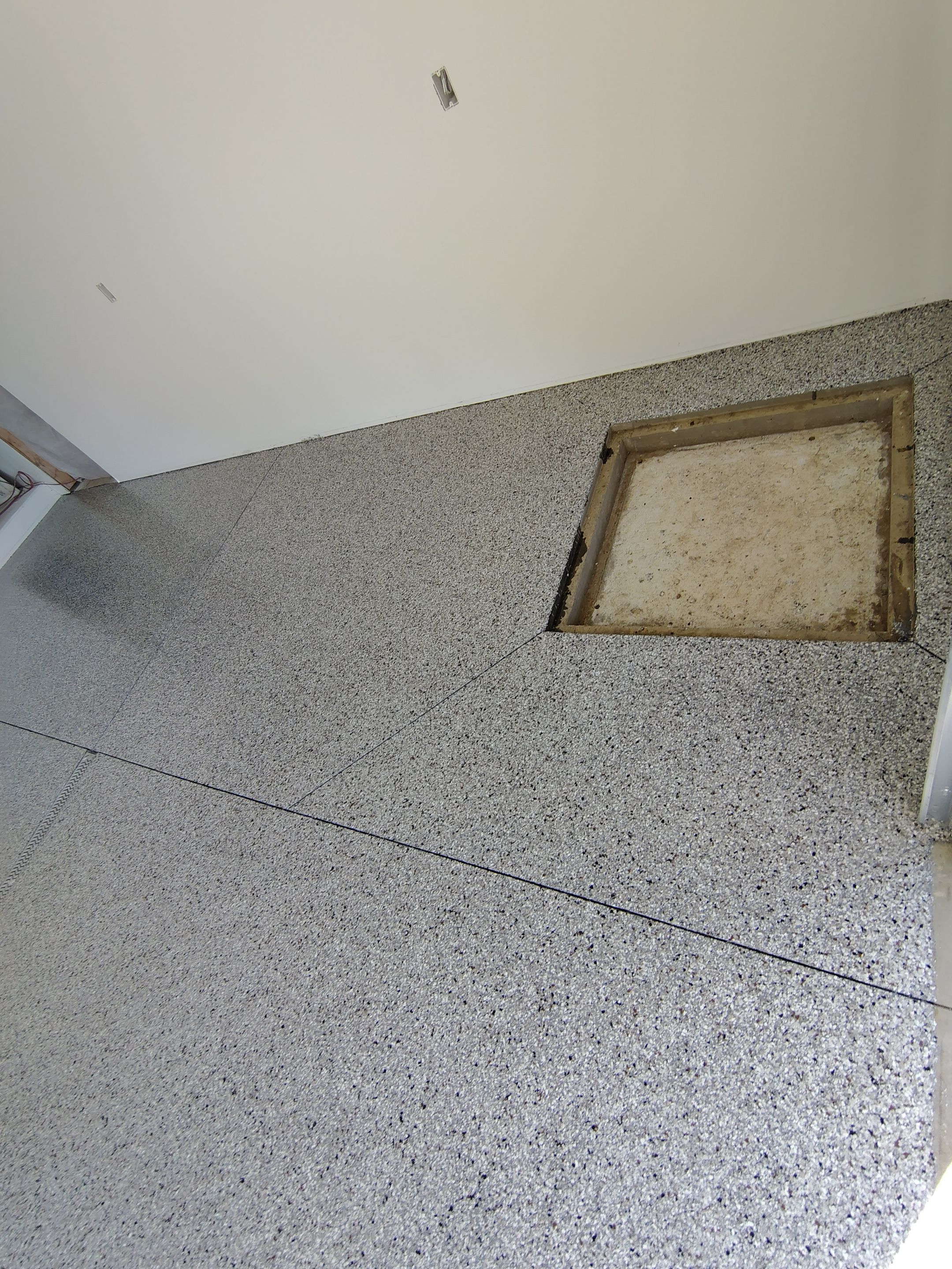 Custom Garage and Basement Epoxy Floor Coating in Menno by Select Painting, Coatings & Garage Cabinets