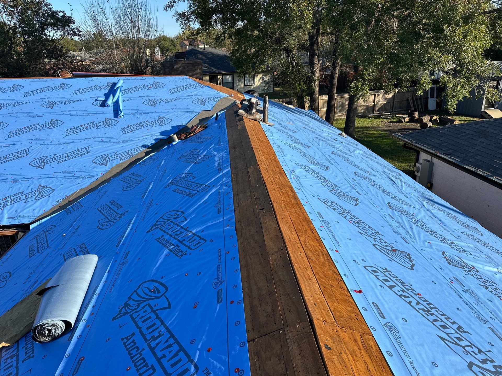 Residential Roofing Installation using Atlas Prolam Black Shadow by Motion Roofing