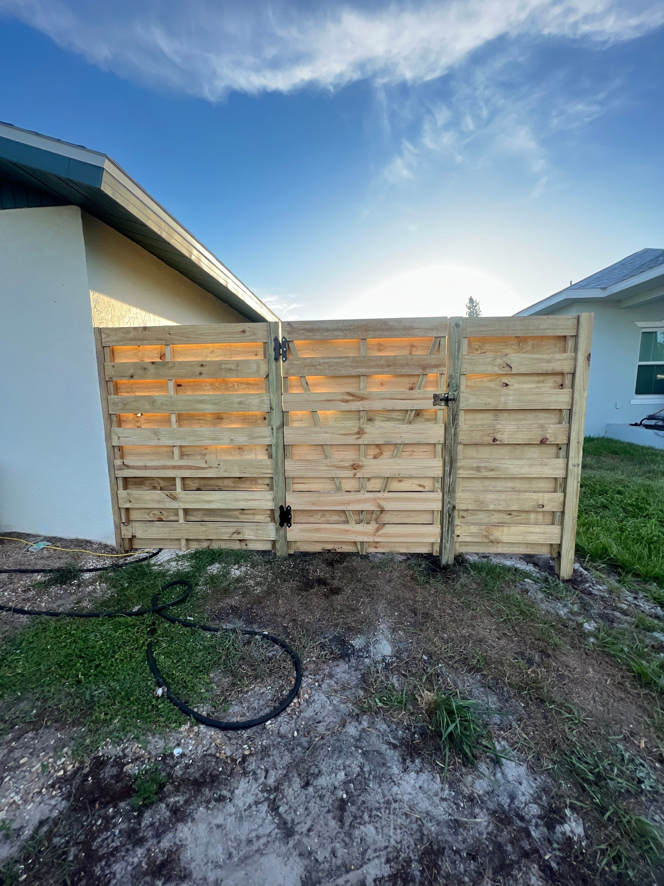 Wood Fence Installation using Horizontal Shadowbox Wood Privacy Fence by Asap fence and gates, LLC