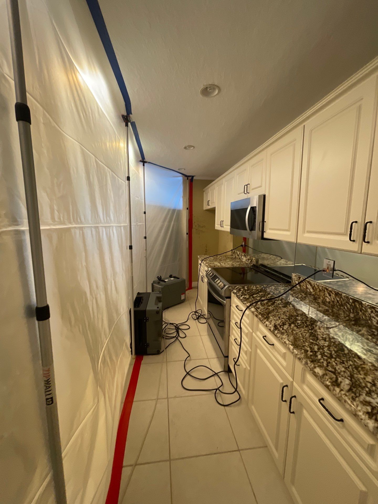 Mold remediation and rebuild of kitchen and living areas by Bay Coast Restoration 