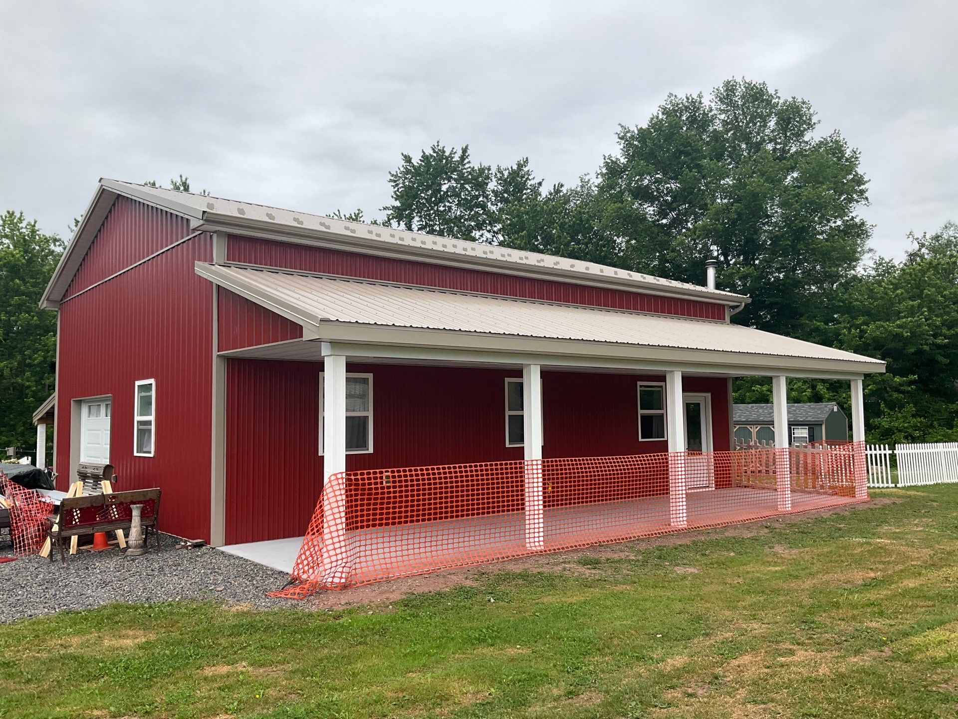 Covered Concrete Porch Addition and Exterior Door Installation in Tower City by Esh Builders