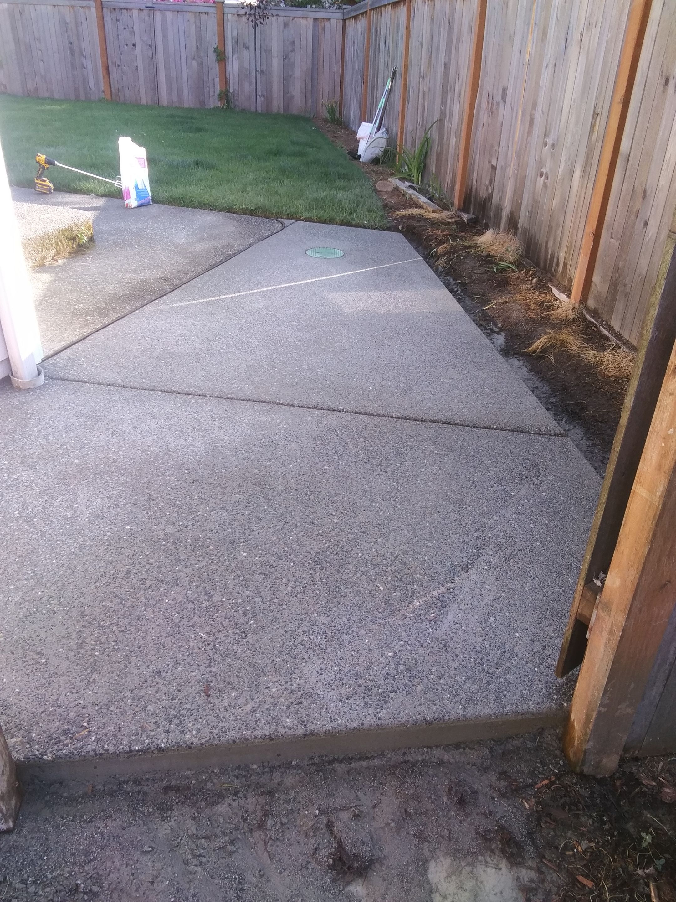 Russ | Concrete Patio  by Jireh Asphalt & Concrete Inc 