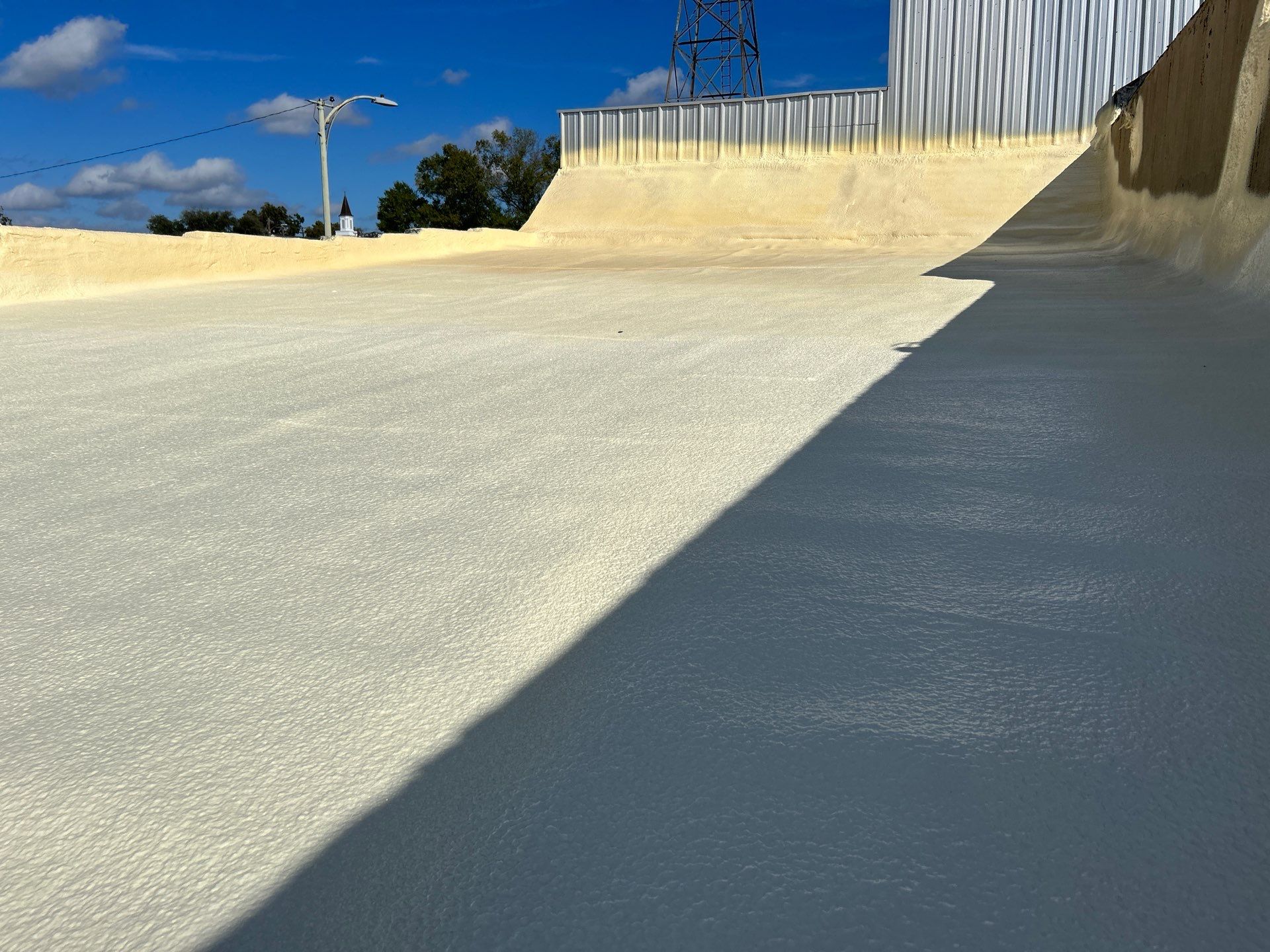 Downtown Gladewater Commercial Foam Roof Restoration – SPF + High-Tensile Acrylic by All Star Roofing LLC