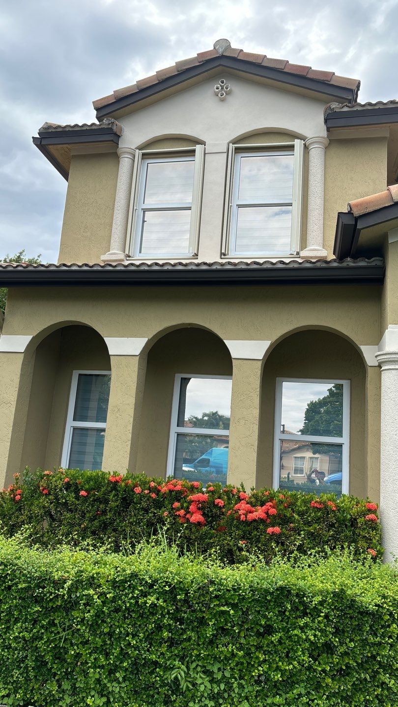 New Windows and Doors with a Striking Front Entry Door by ASP SuperHome