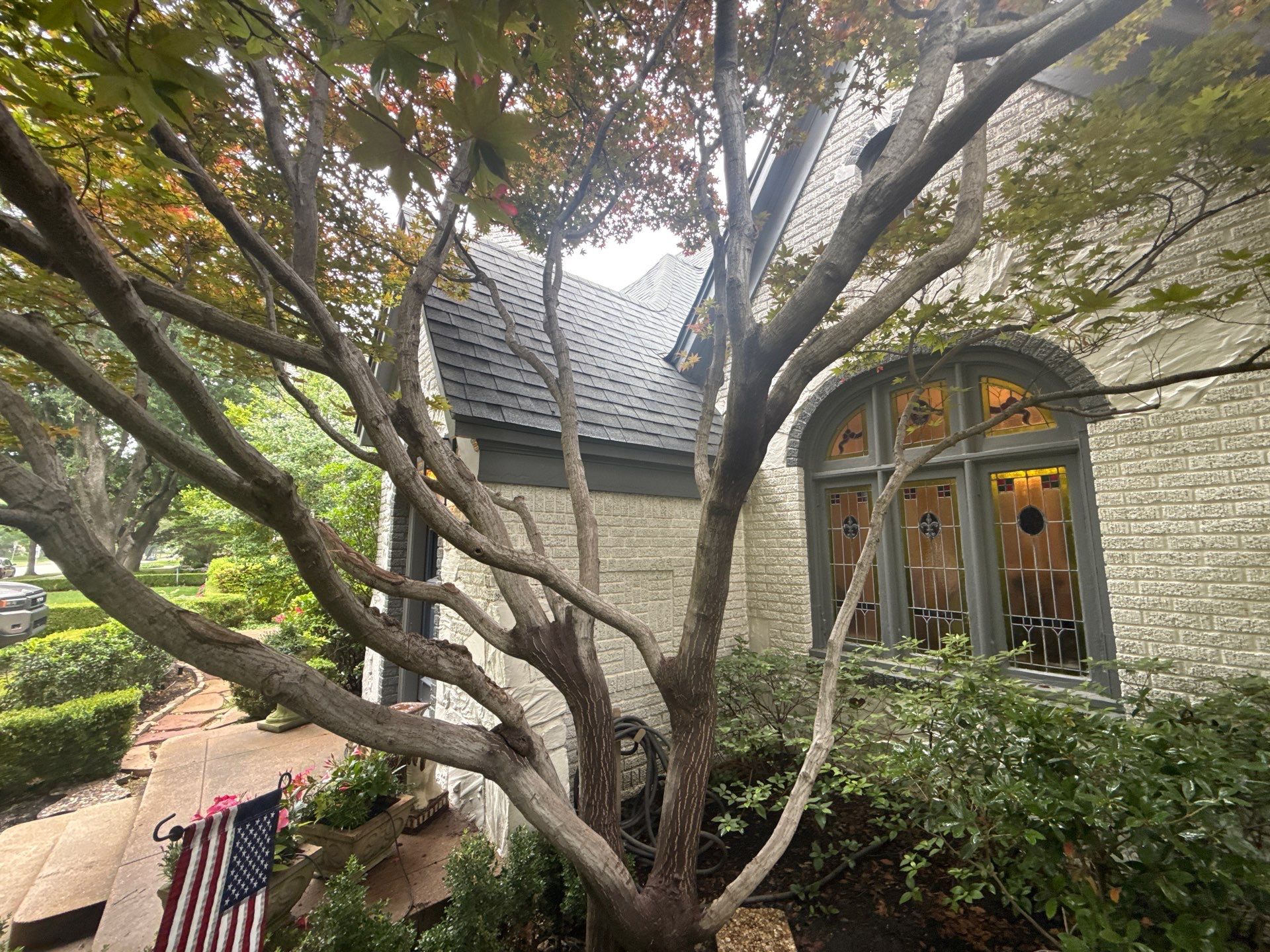Residential Gutter Installation and Exterior Maintenance for Dallas White Brick Home by First Out Roofing 
