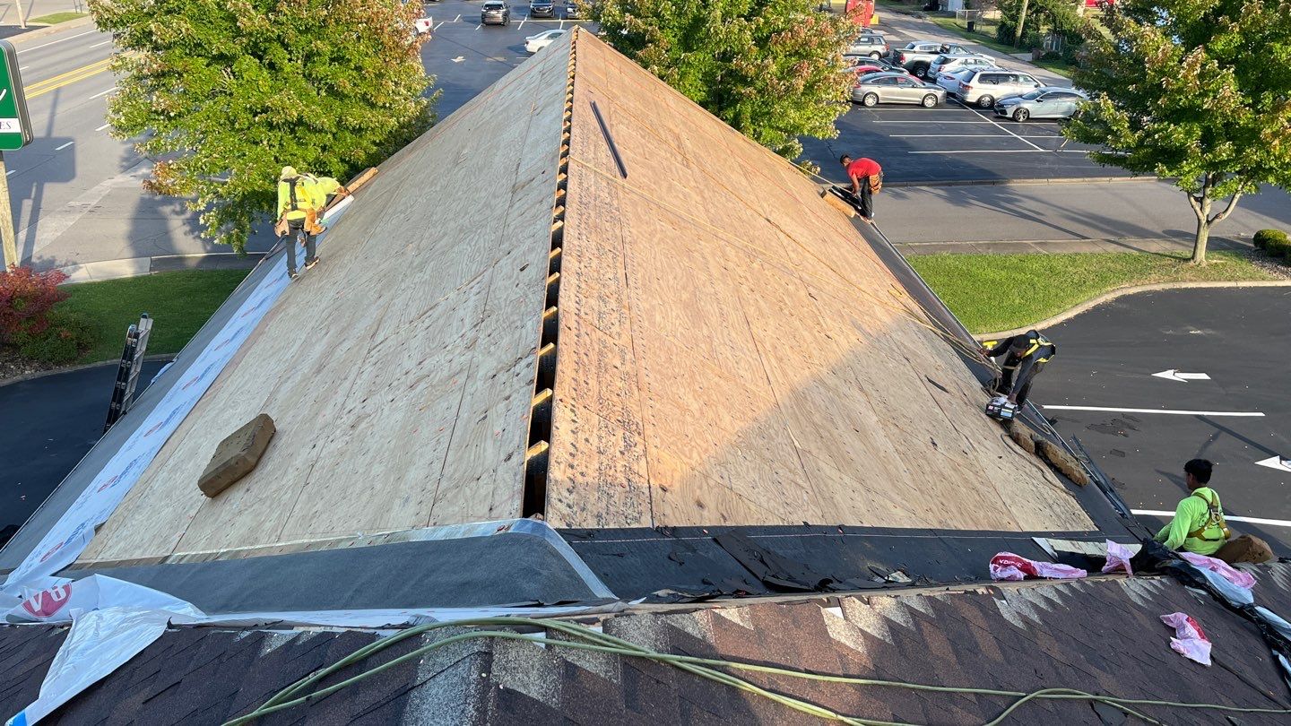 Commercial Roofing Installation using Performance Shingles by Mr. Roofer