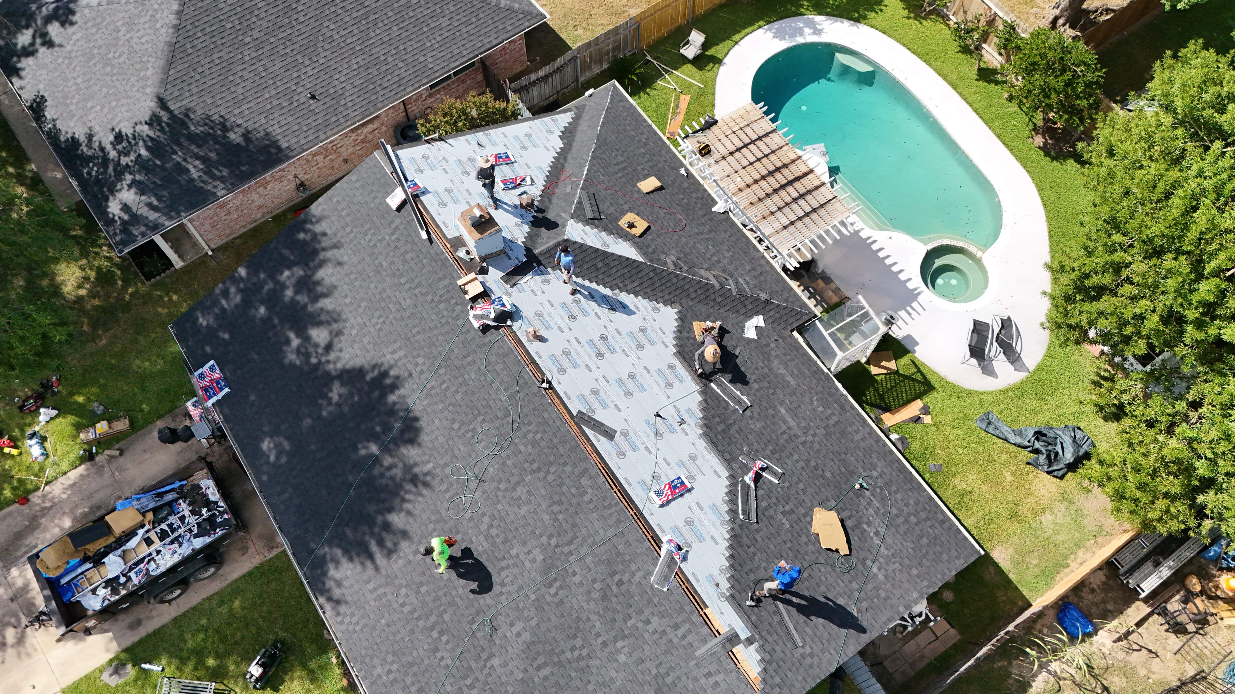 Poolside Roof Replacement in Smoky Gray — Houston, TX by PL Roofing & SB Roofing, LLC.
