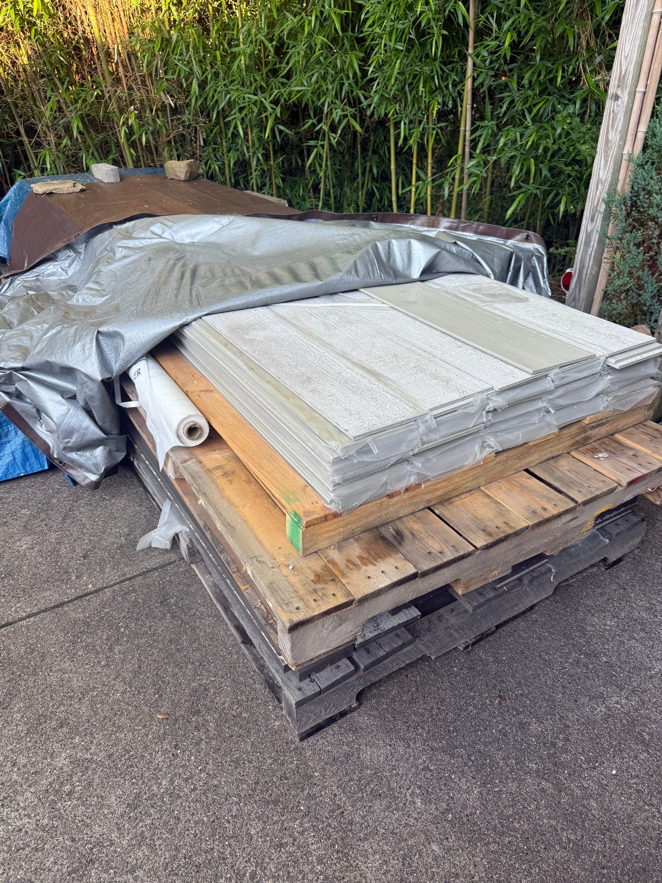 Custom hardie  by Cousins Roofing Siding & Decks