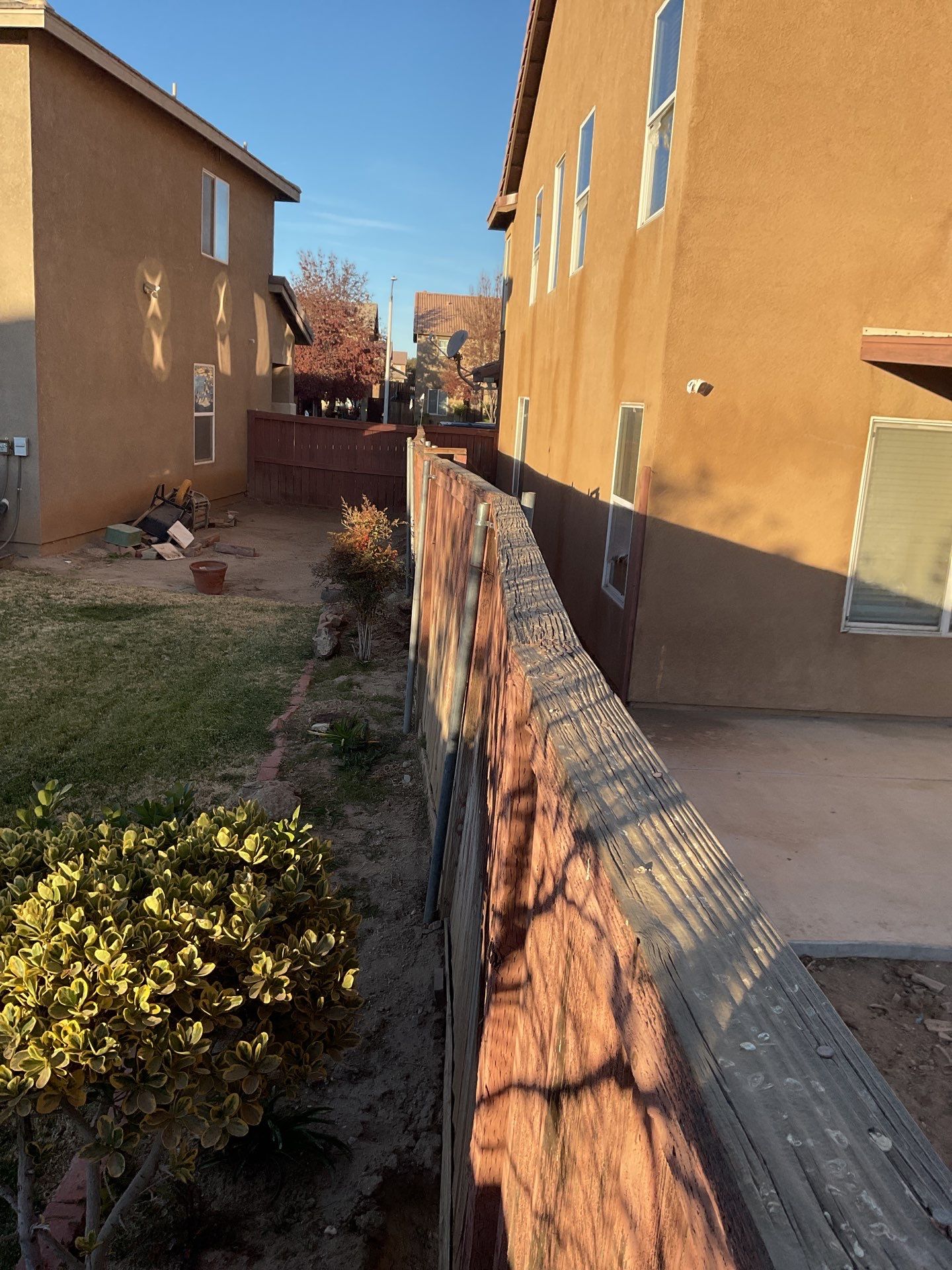 Fence installation using wood by Fence Guys Inc.