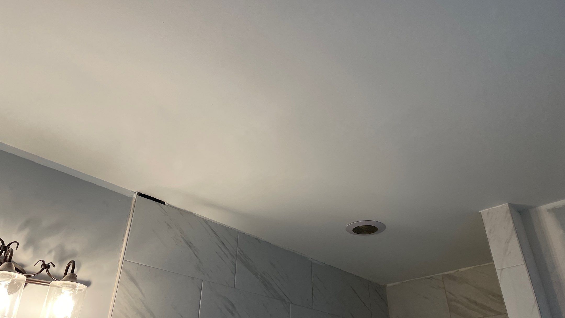 Bright Bathroom Remodel with Wall Removal, Stand Alone Tub and New Vanity by Footprints Floors of Coastal Carolina