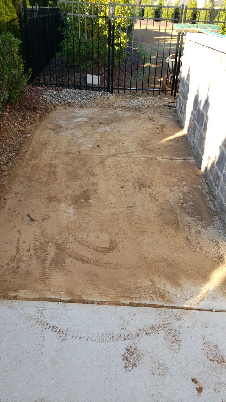 Driveway Clean using cleaner by Power Wash Masters LLC