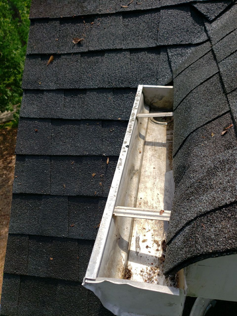 Gutter Cleaning using water by G&H Home Tech Pros LLC